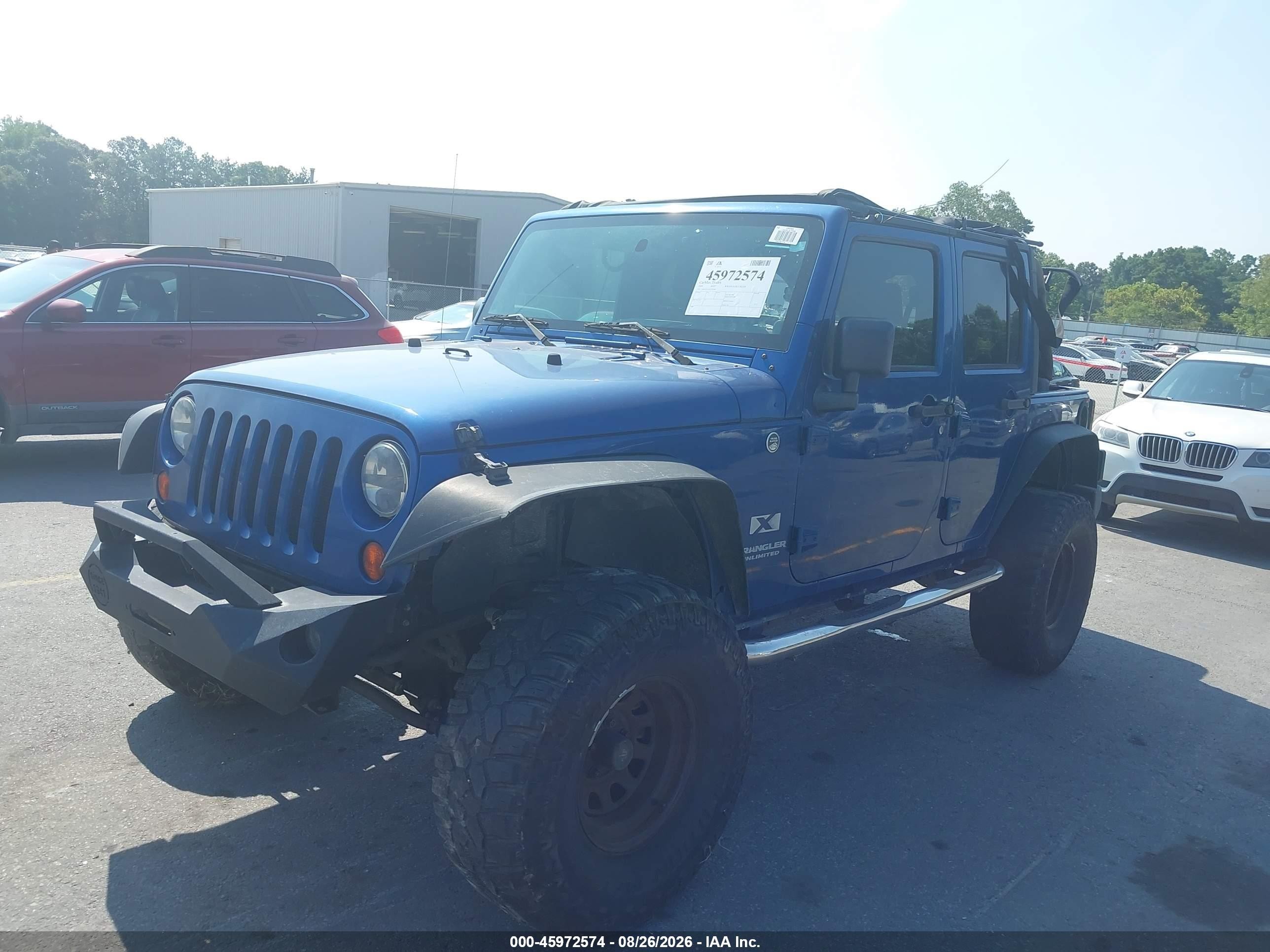 2009 Jeep Wrangler Unlimited X Blue vin: 1J4GA39119L774580