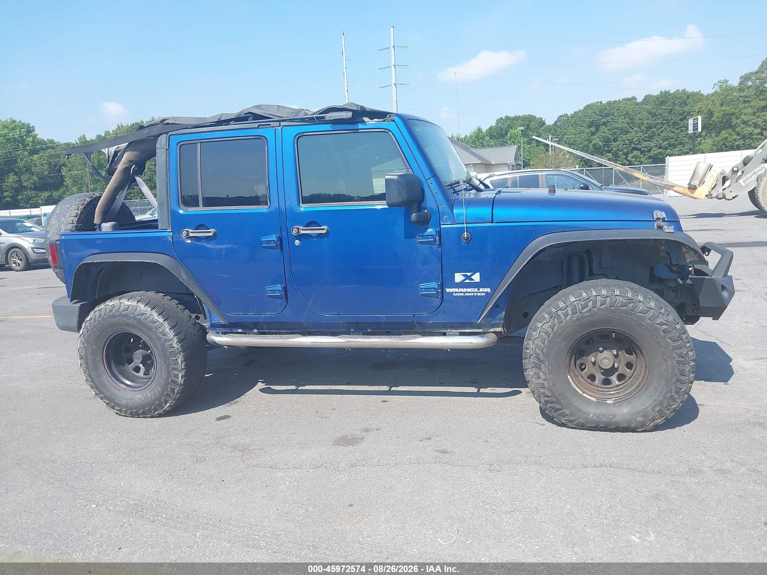 2009 Jeep Wrangler Unlimited X Blue vin: 1J4GA39119L774580