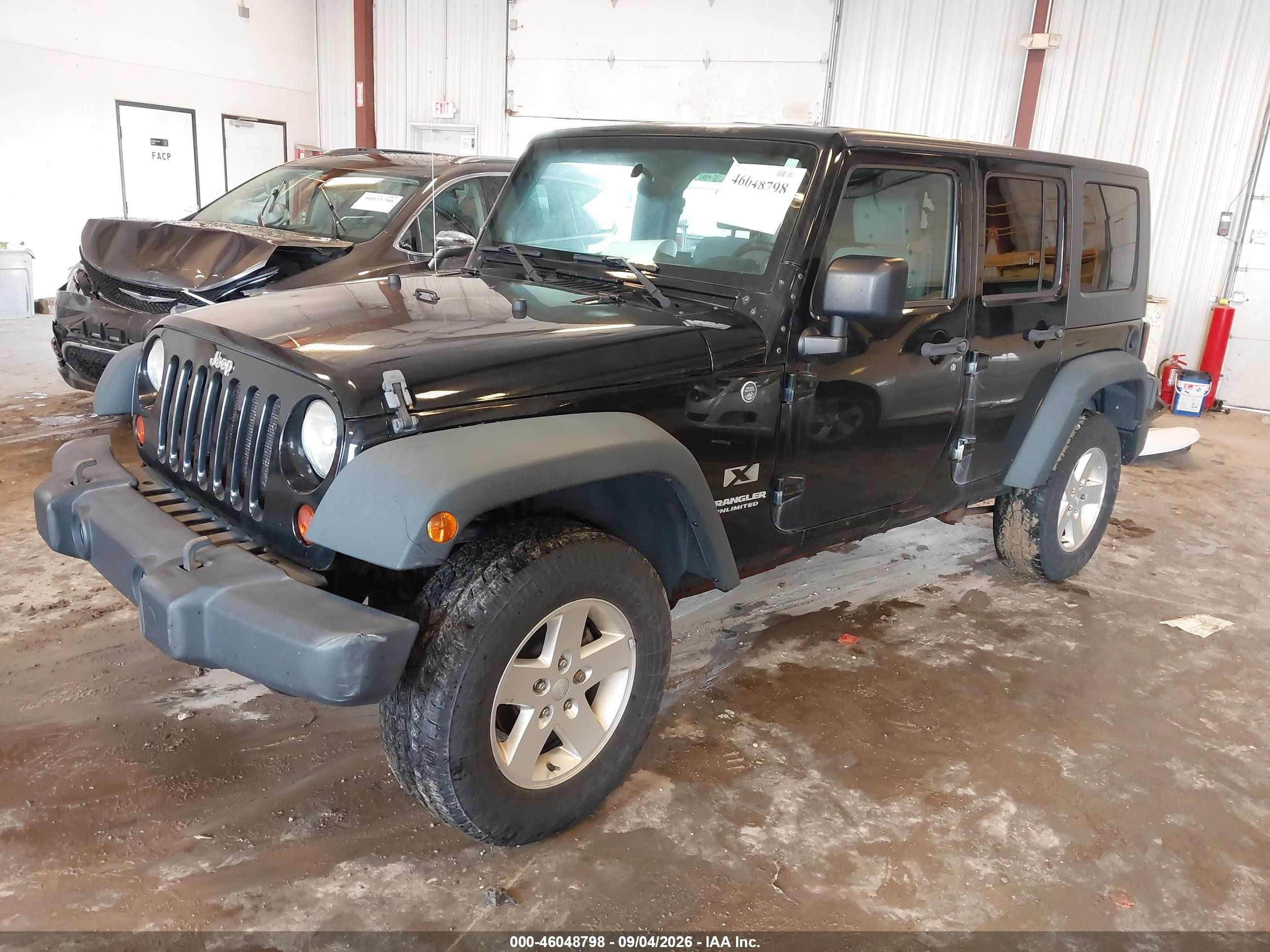 2009 Jeep Wrangler Unlimited X Black vin: 1J4GA39129L749199