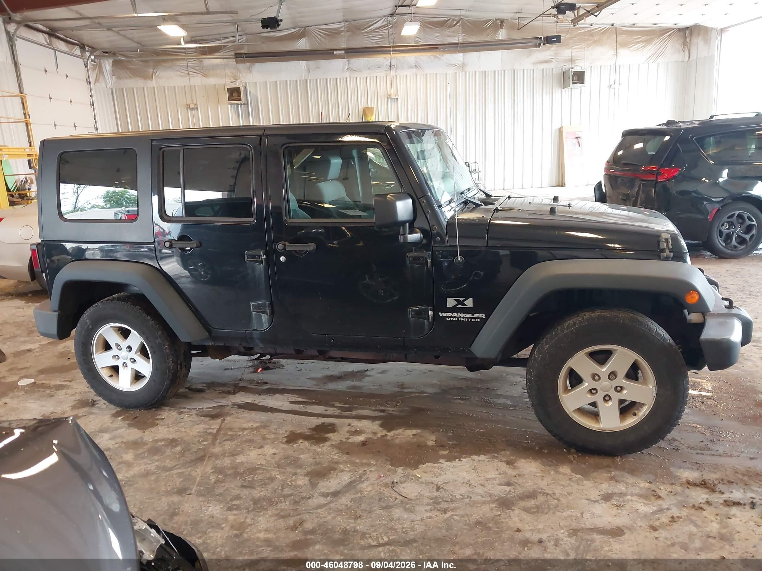 2009 Jeep Wrangler Unlimited X Black vin: 1J4GA39129L749199