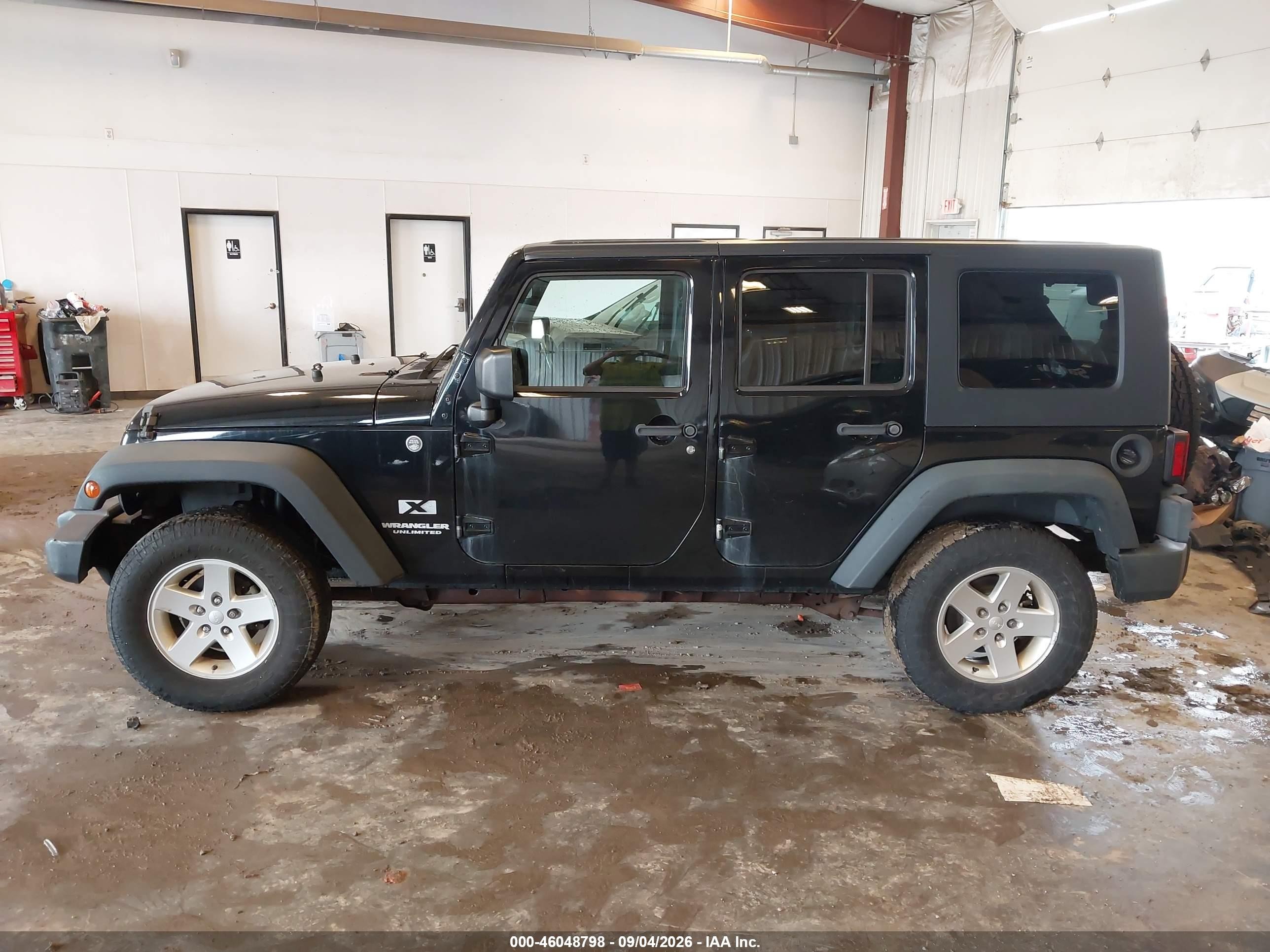 2009 Jeep Wrangler Unlimited X Black vin: 1J4GA39129L749199