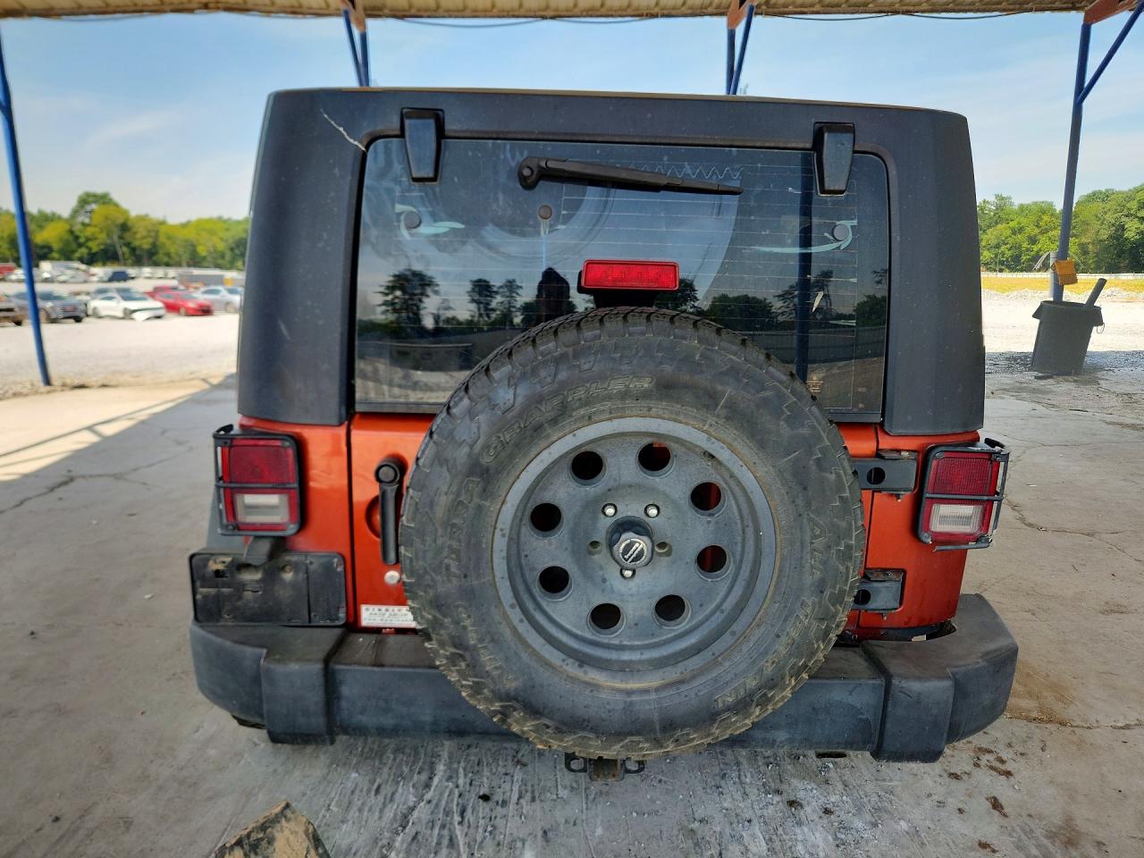 2009 Jeep Wrangler Unlimited X Оранжевый vin: 1J4GA39129L770876
