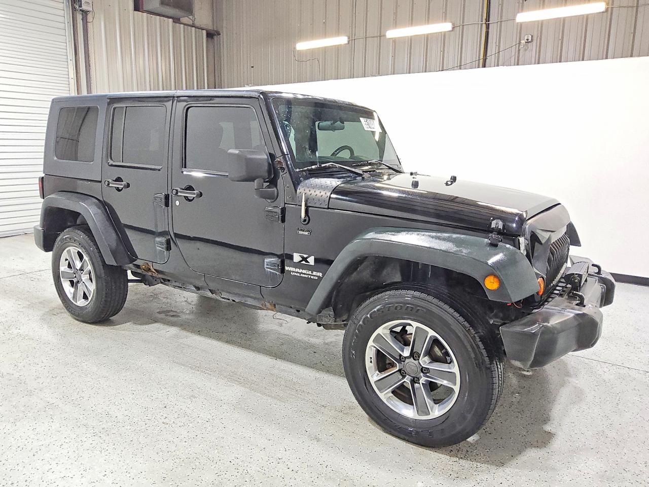 2009 Jeep Wrangler Unlimited X Черный vin: 1J4GA39139L720830