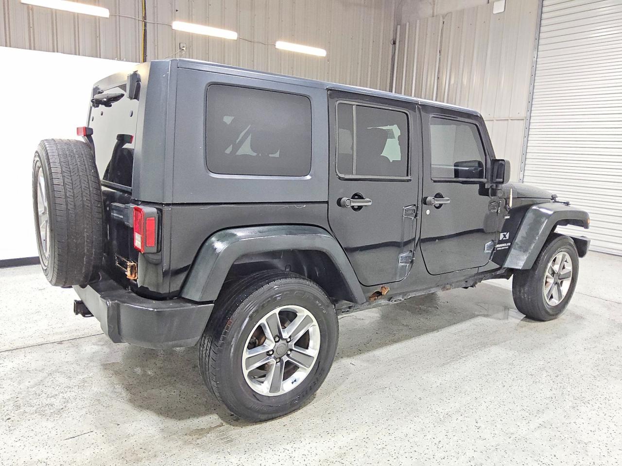 2009 Jeep Wrangler Unlimited X Черный vin: 1J4GA39139L720830