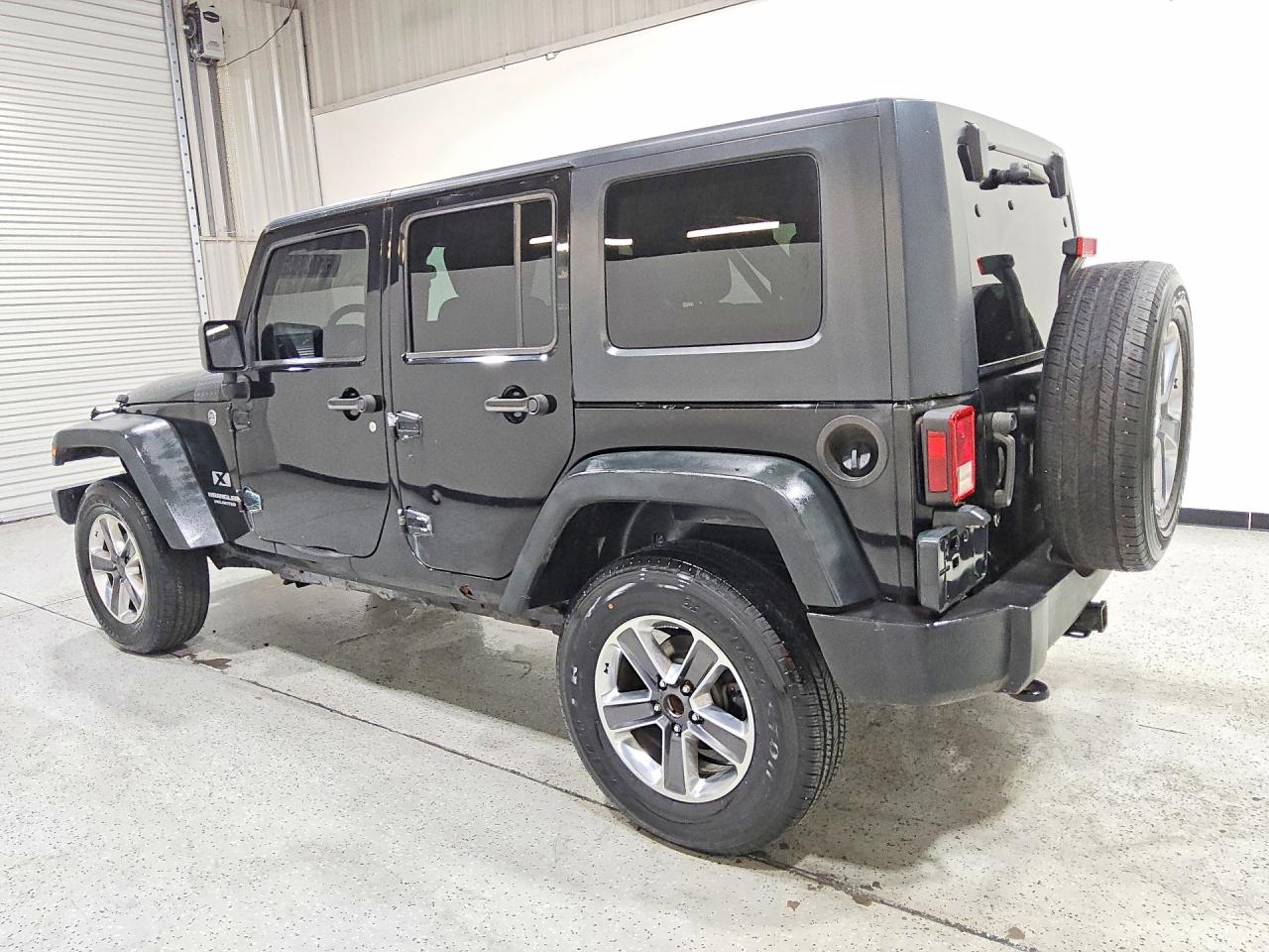 2009 Jeep Wrangler Unlimited X Черный vin: 1J4GA39139L720830