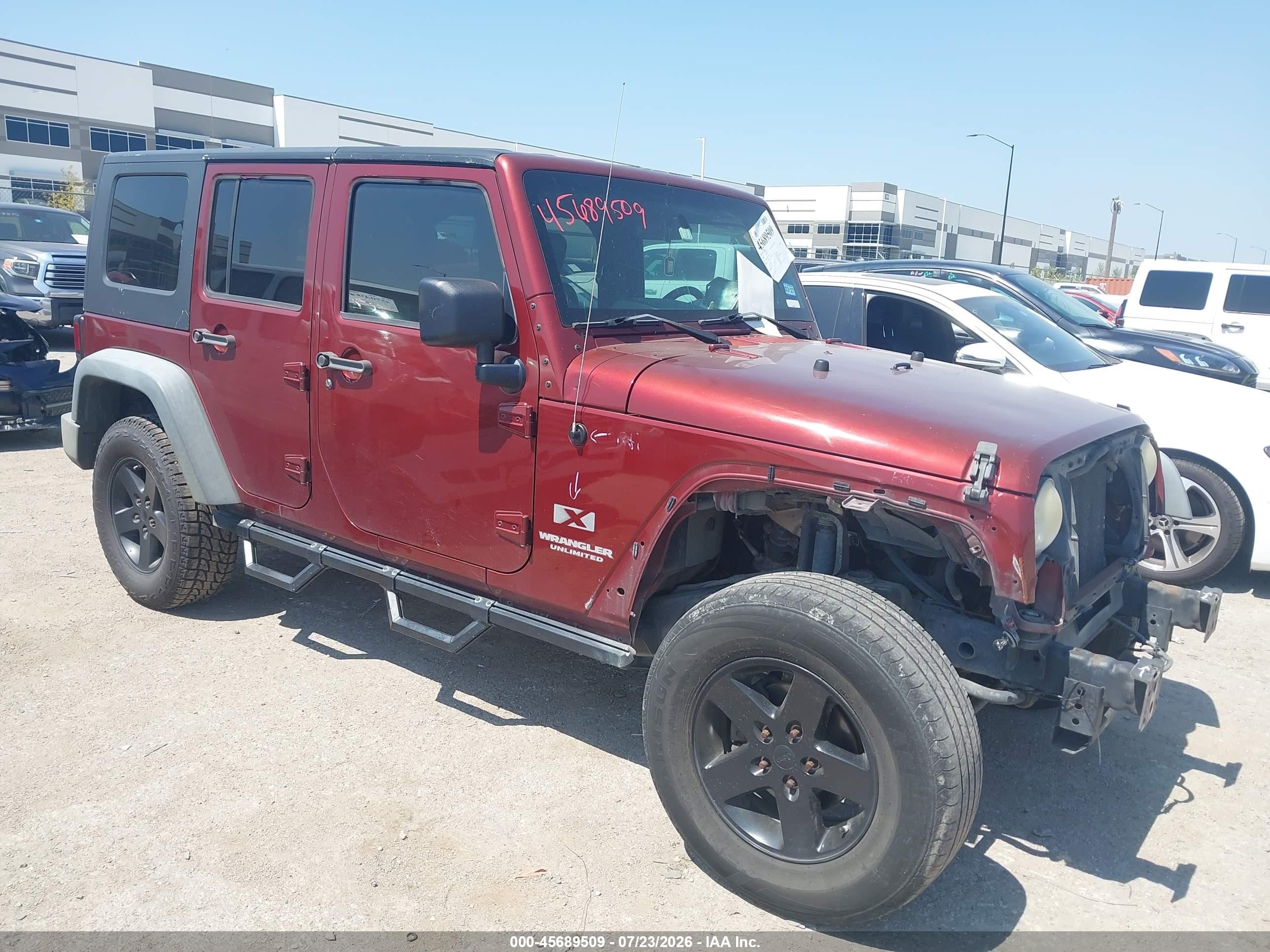 2009 Jeep Wrangler Unlimited X Burgundy vin: 1J4GA39139L730323