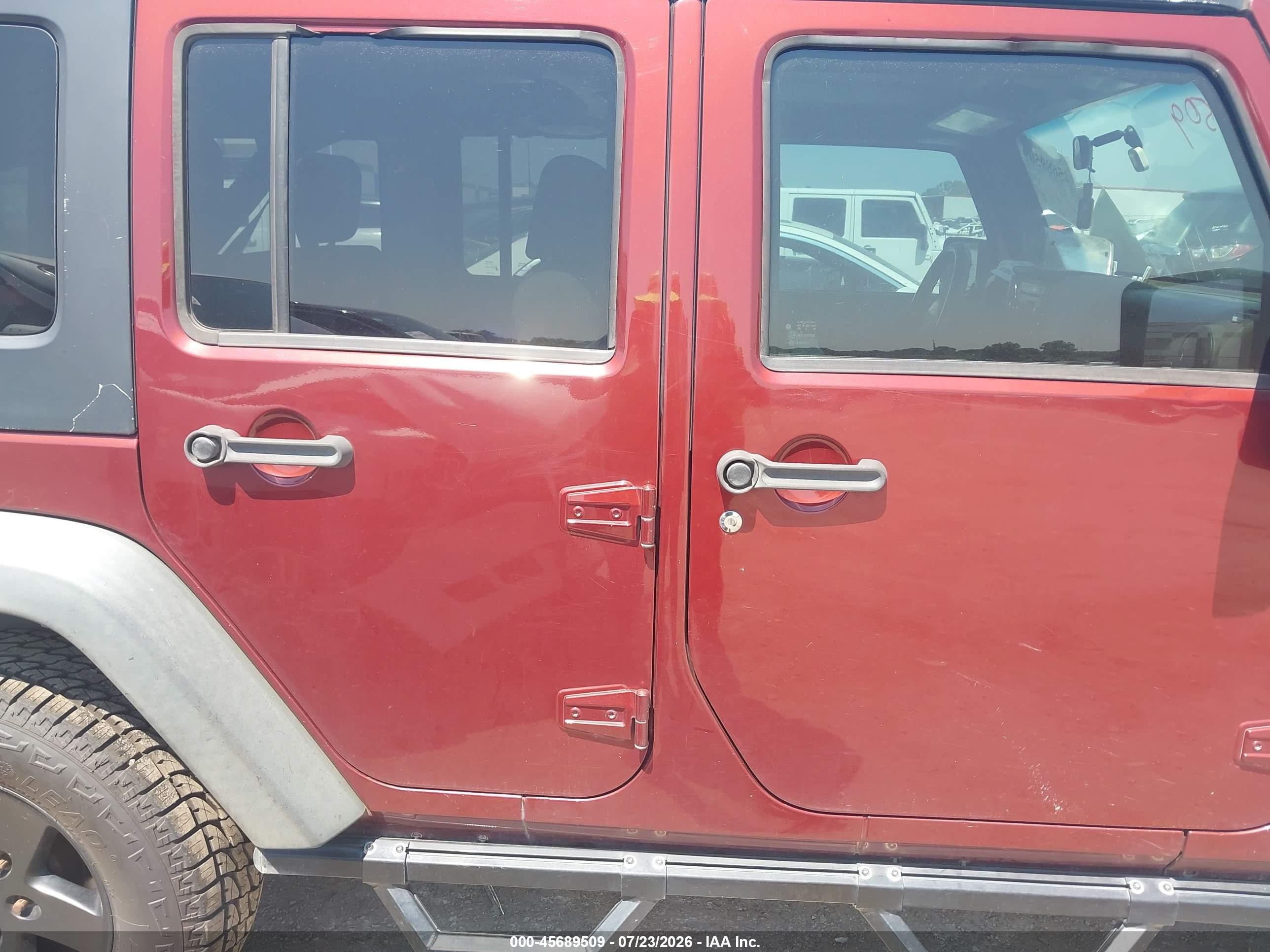 2009 Jeep Wrangler Unlimited X Burgundy vin: 1J4GA39139L730323