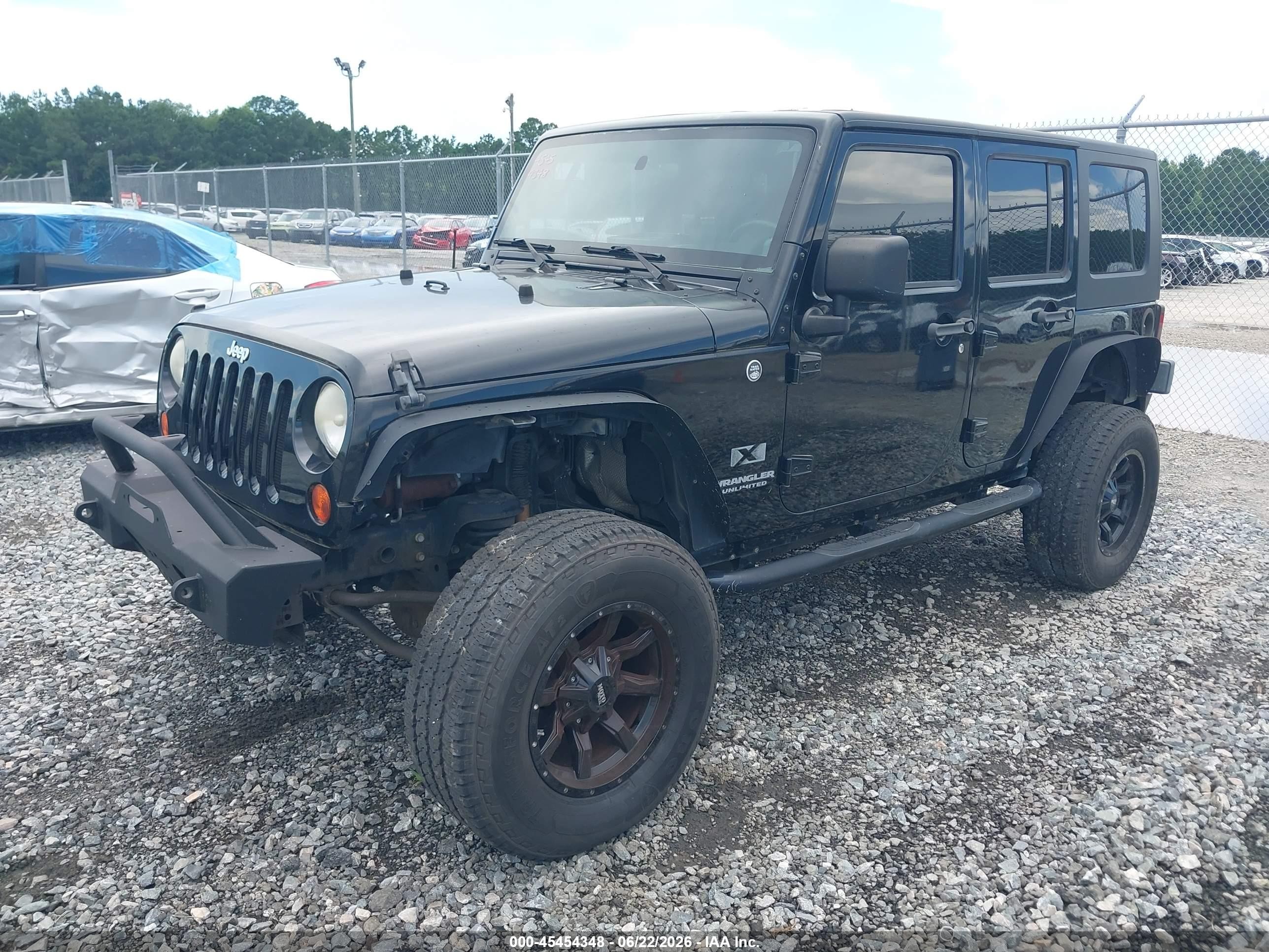 2009 Jeep Wrangler Unlimited X Black vin: 1J4GA39139L772166