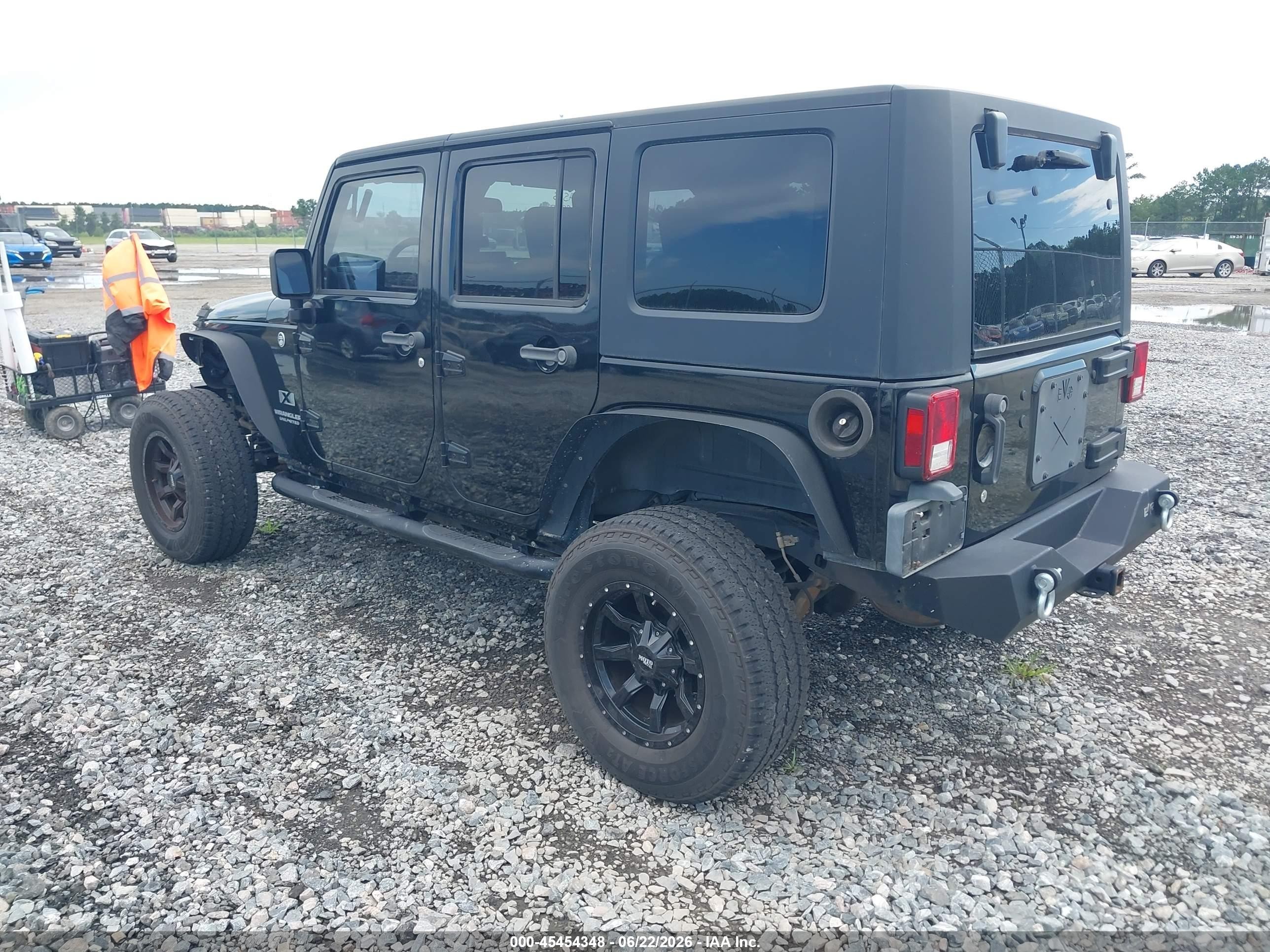 2009 Jeep Wrangler Unlimited X Black vin: 1J4GA39139L772166
