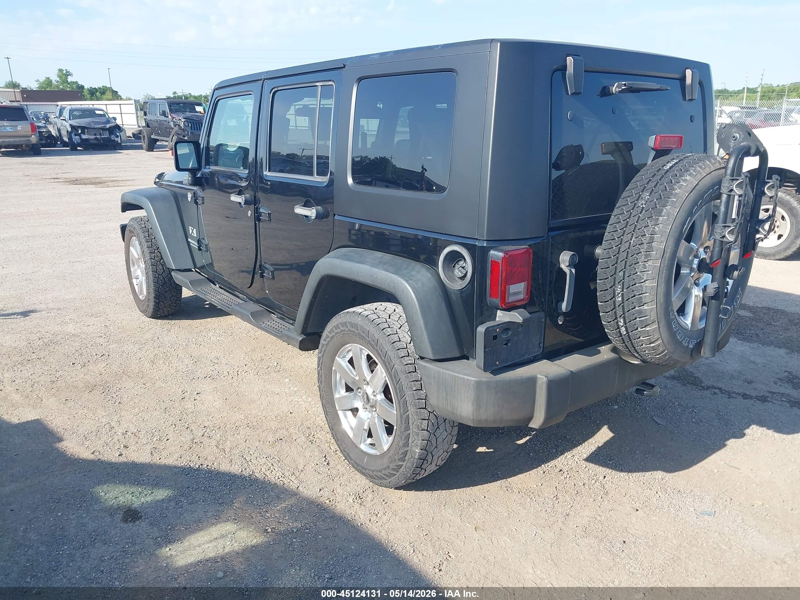 2008 Jeep Wrangler Unlimited X Черный vin: 1J4GA39148L536107