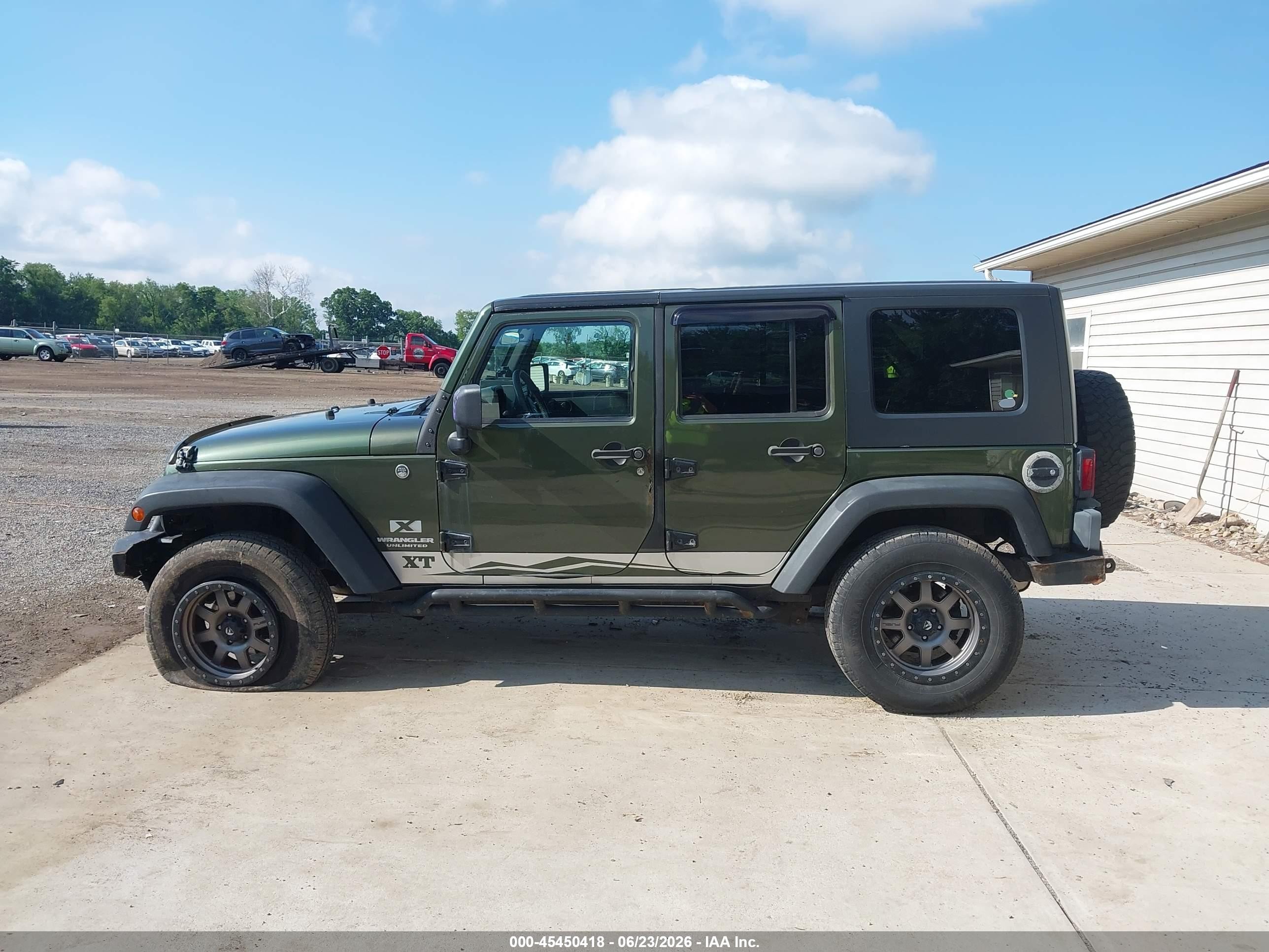 2009 Jeep Wrangler Unlimited X Green vin: 1J4GA39149L711196
