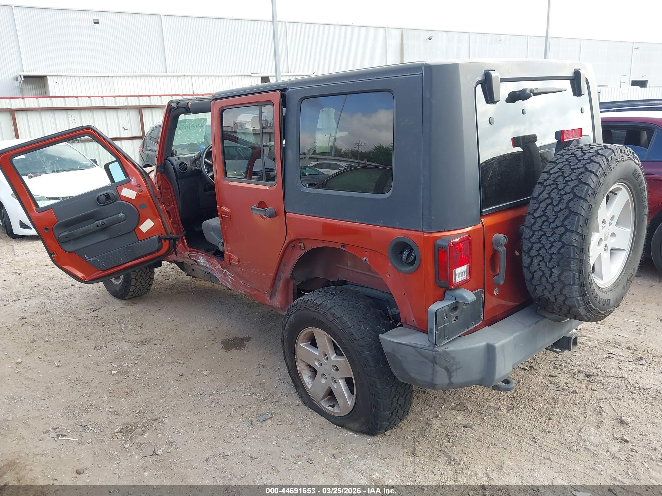 2009 Jeep Wrangler Unlimited X Orange vin: 1J4GA39149L749947