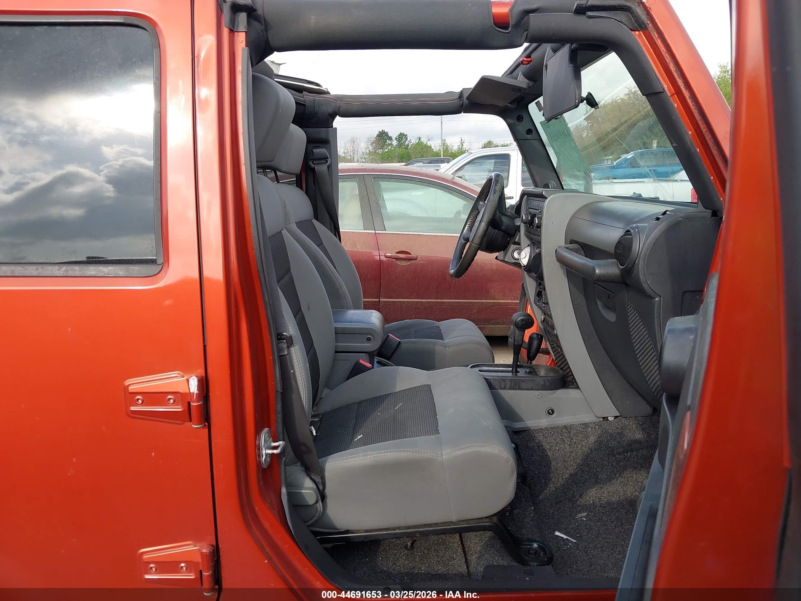 2009 Jeep Wrangler Unlimited X Orange vin: 1J4GA39149L749947