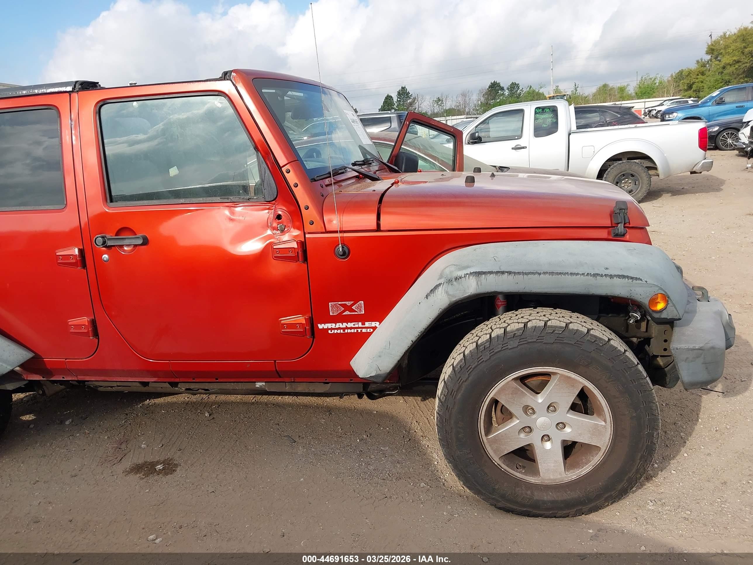 2009 Jeep Wrangler Unlimited X Orange vin: 1J4GA39149L749947
