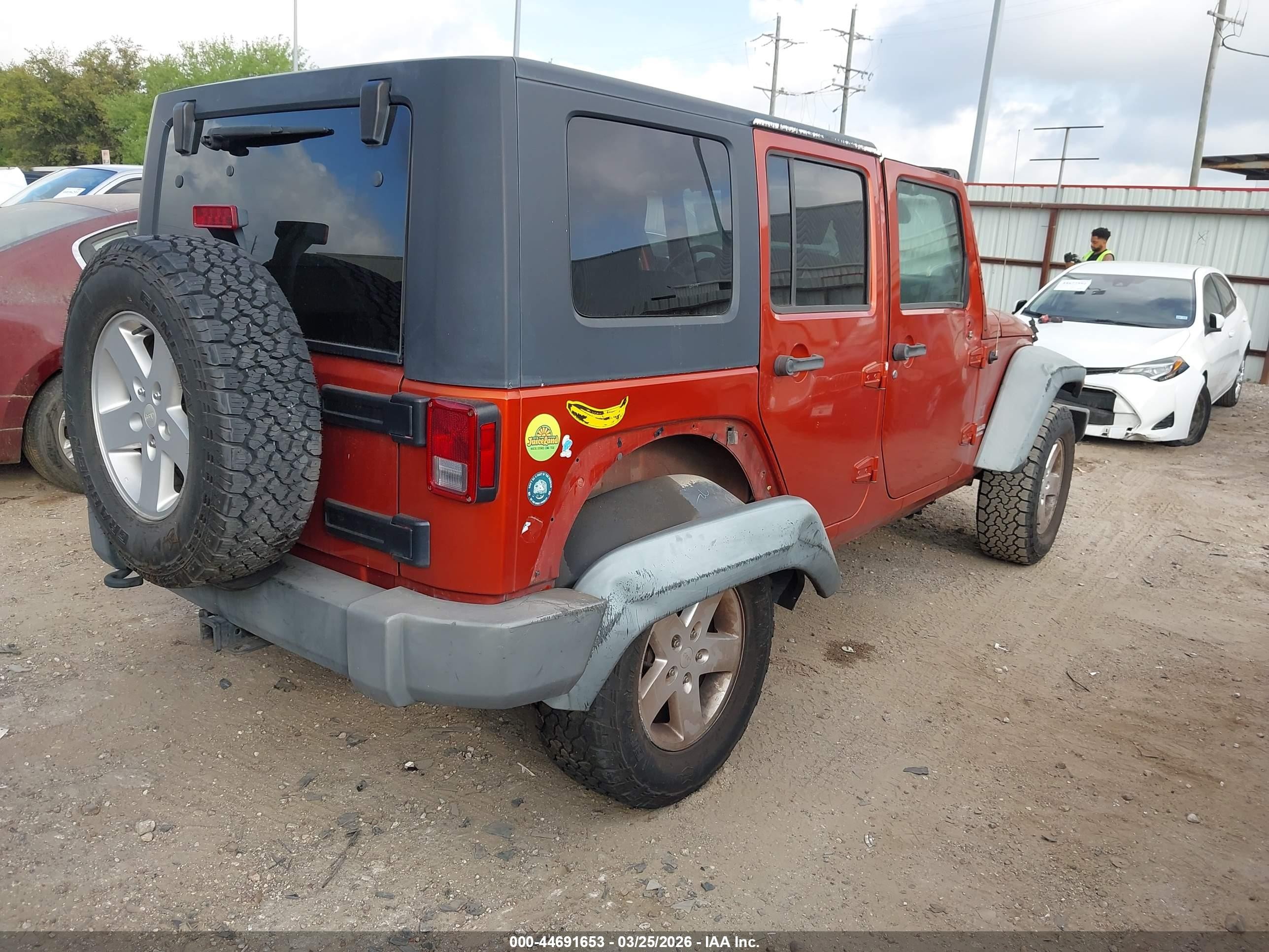 2009 Jeep Wrangler Unlimited X Orange vin: 1J4GA39149L749947