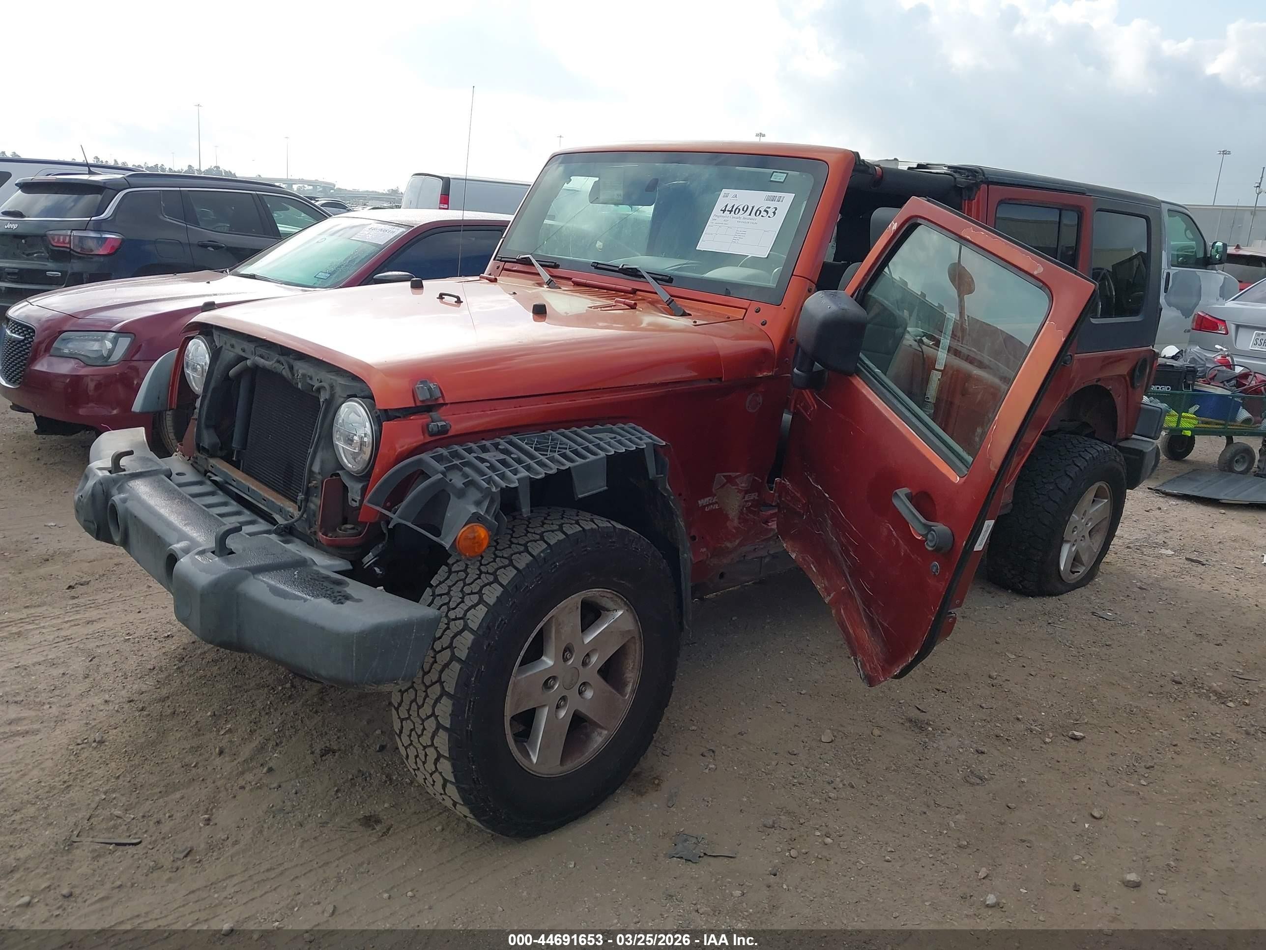 2009 Jeep Wrangler Unlimited X Orange vin: 1J4GA39149L749947