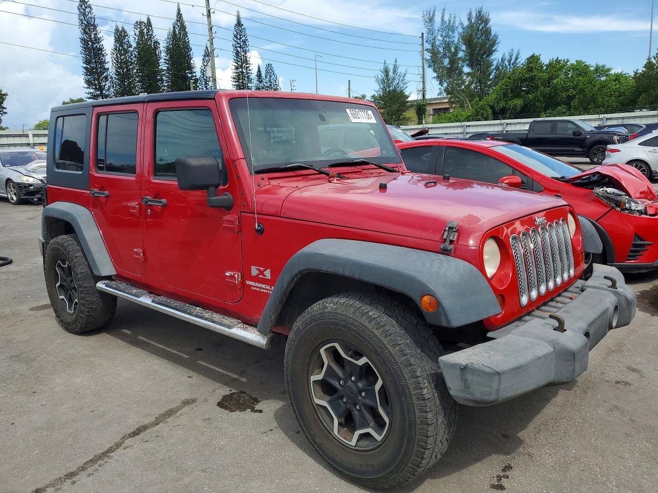 2008 Jeep Wrangler Unlimited X Red vin: 1J4GA39158L636278
