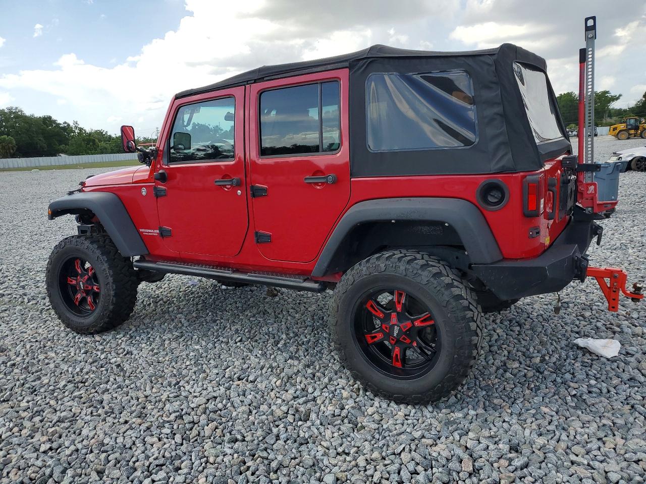 2009 Jeep Wrangler Unlimited X Red vin: 1J4GA39159L708100
