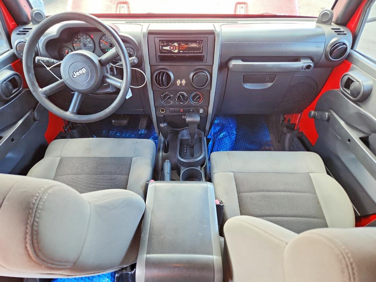 2009 Jeep Wrangler Unlimited X Red vin: 1J4GA39159L708100