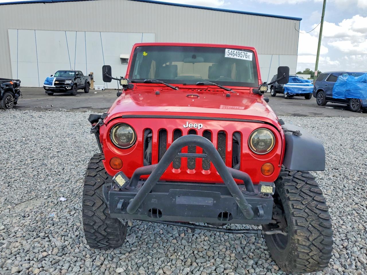 2009 Jeep Wrangler Unlimited X Red vin: 1J4GA39159L708100