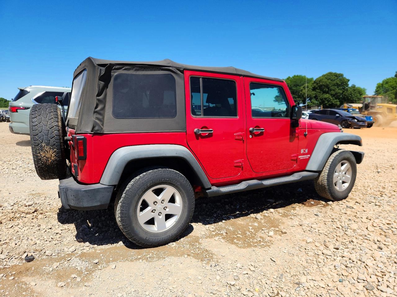 2009 Jeep Wrangler Unlimited X Red vin: 1J4GA39179L704033