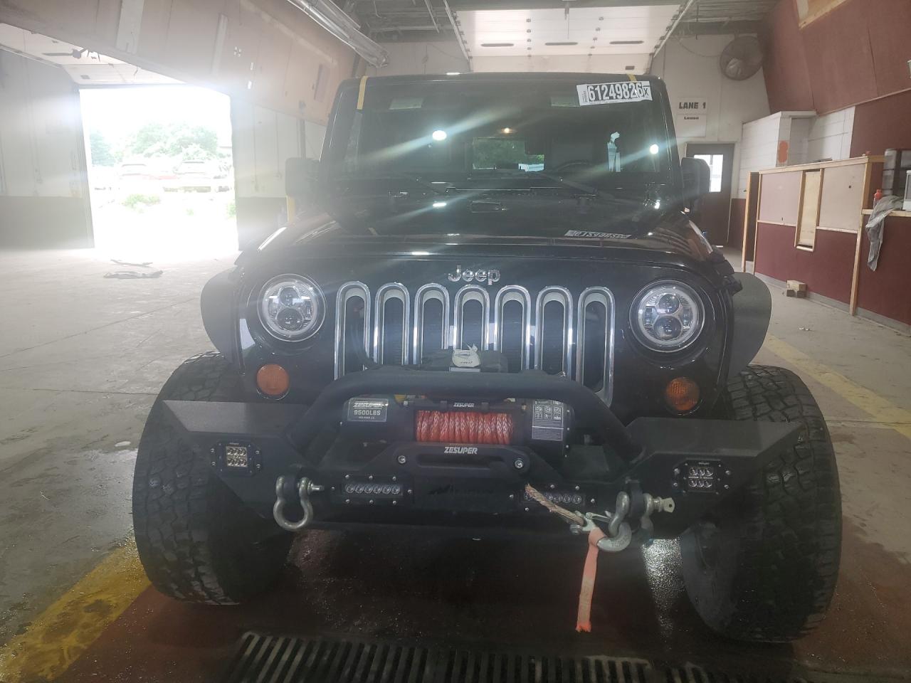 2009 Jeep Wrangler Unlimited X Black vin: 1J4GA39189L790677 Damage: Front Bumper/Guard, Aftermarket, Acceptable