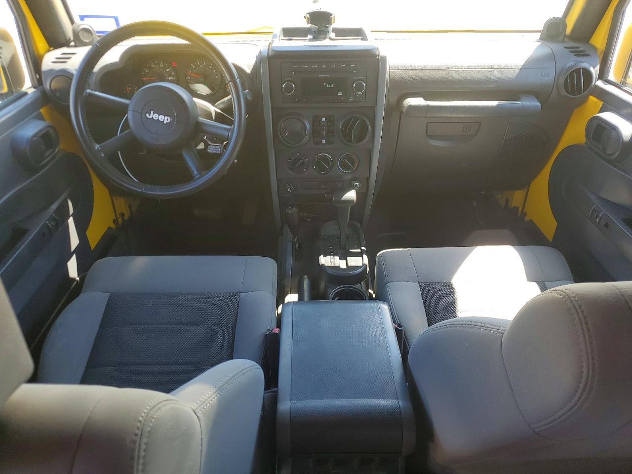 2009 Jeep Wrangler Unlimited X Yellow vin: 1J4GA39199L767716