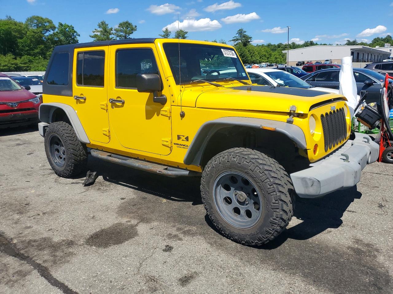 2009 Jeep Wrangler Unlimited X Yellow vin: 1J4GA39199L767716