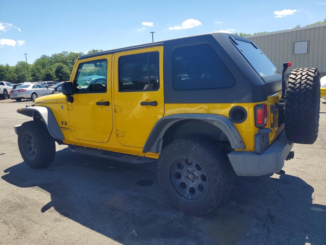 2009 Jeep Wrangler Unlimited X Yellow vin: 1J4GA39199L767716