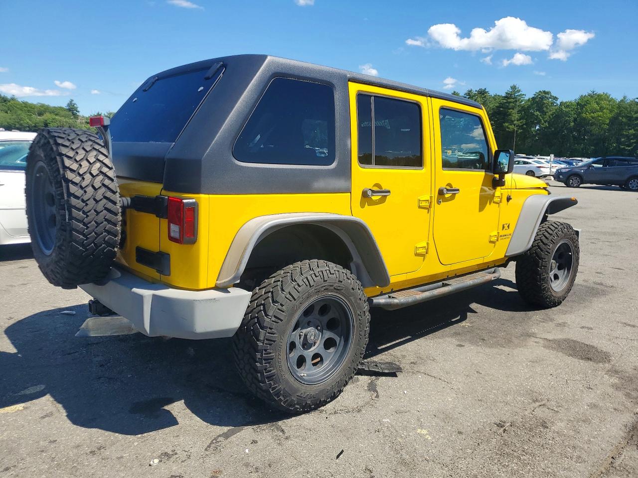 2009 Jeep Wrangler Unlimited X Yellow vin: 1J4GA39199L767716