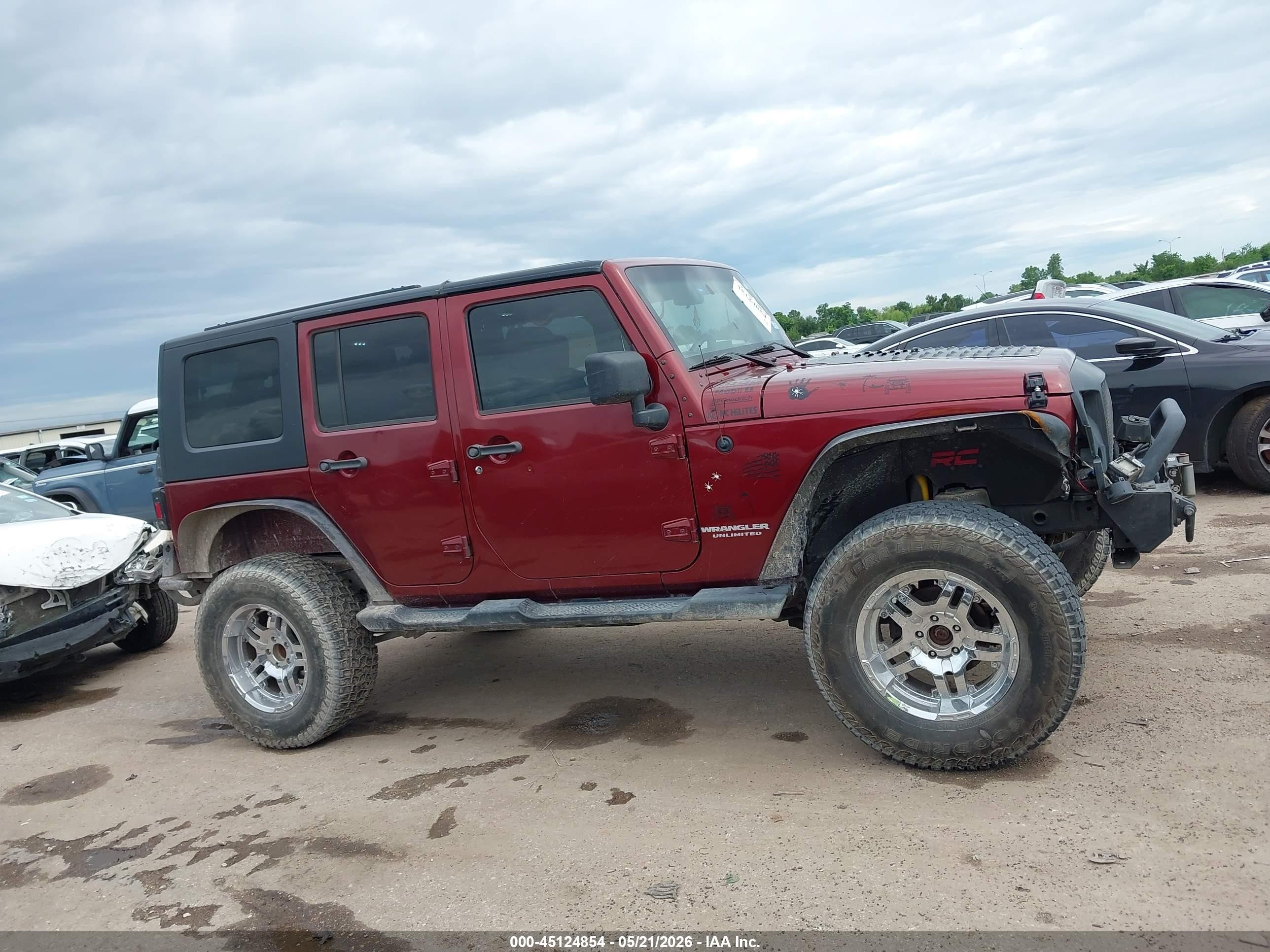 2009 Jeep Wrangler Unlimited X Burgundy vin: 1J4GA391X9L705225