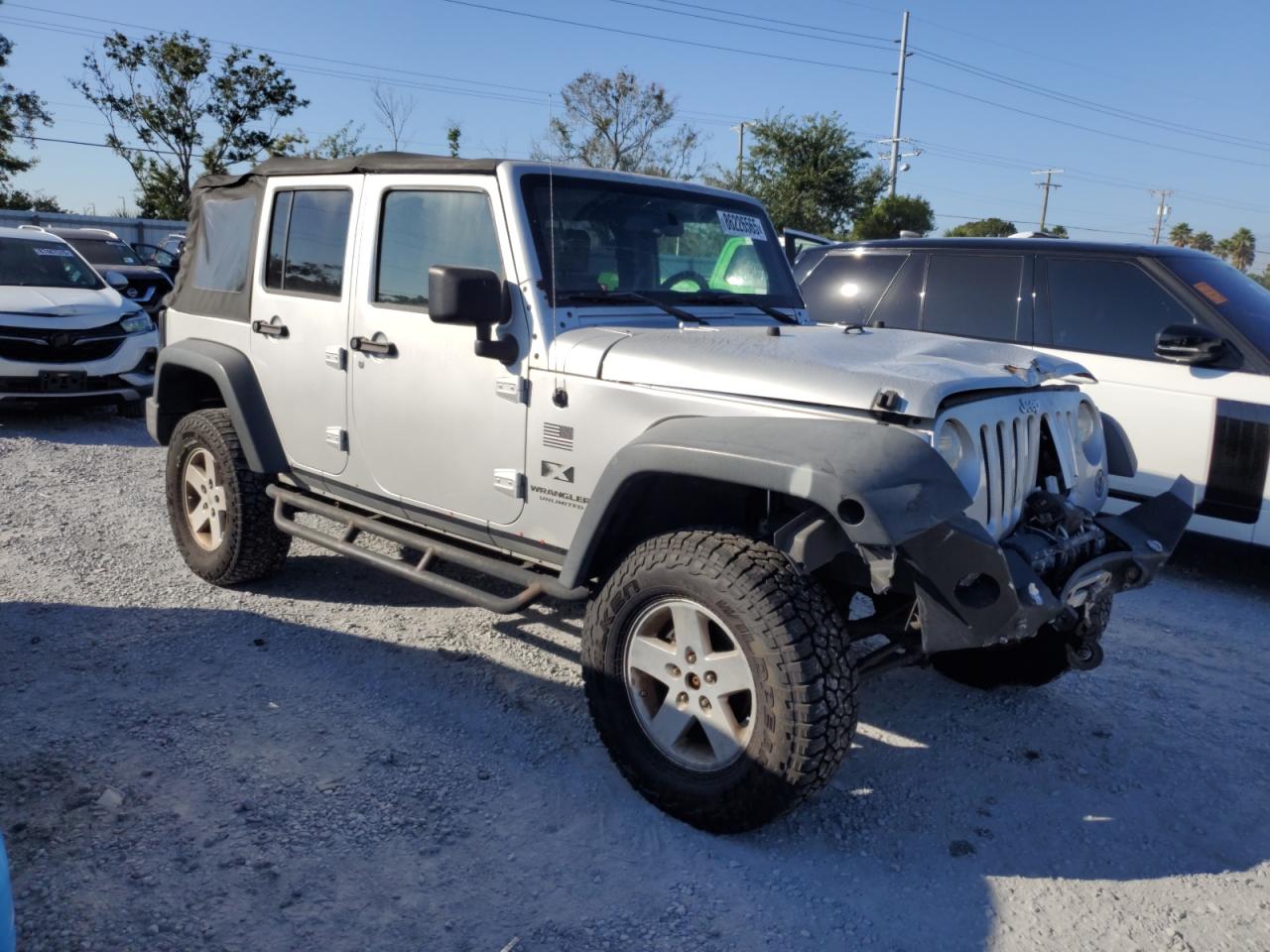 2009 Jeep Wrangler Unlimited X Silver vin: 1J4GA391X9L766008