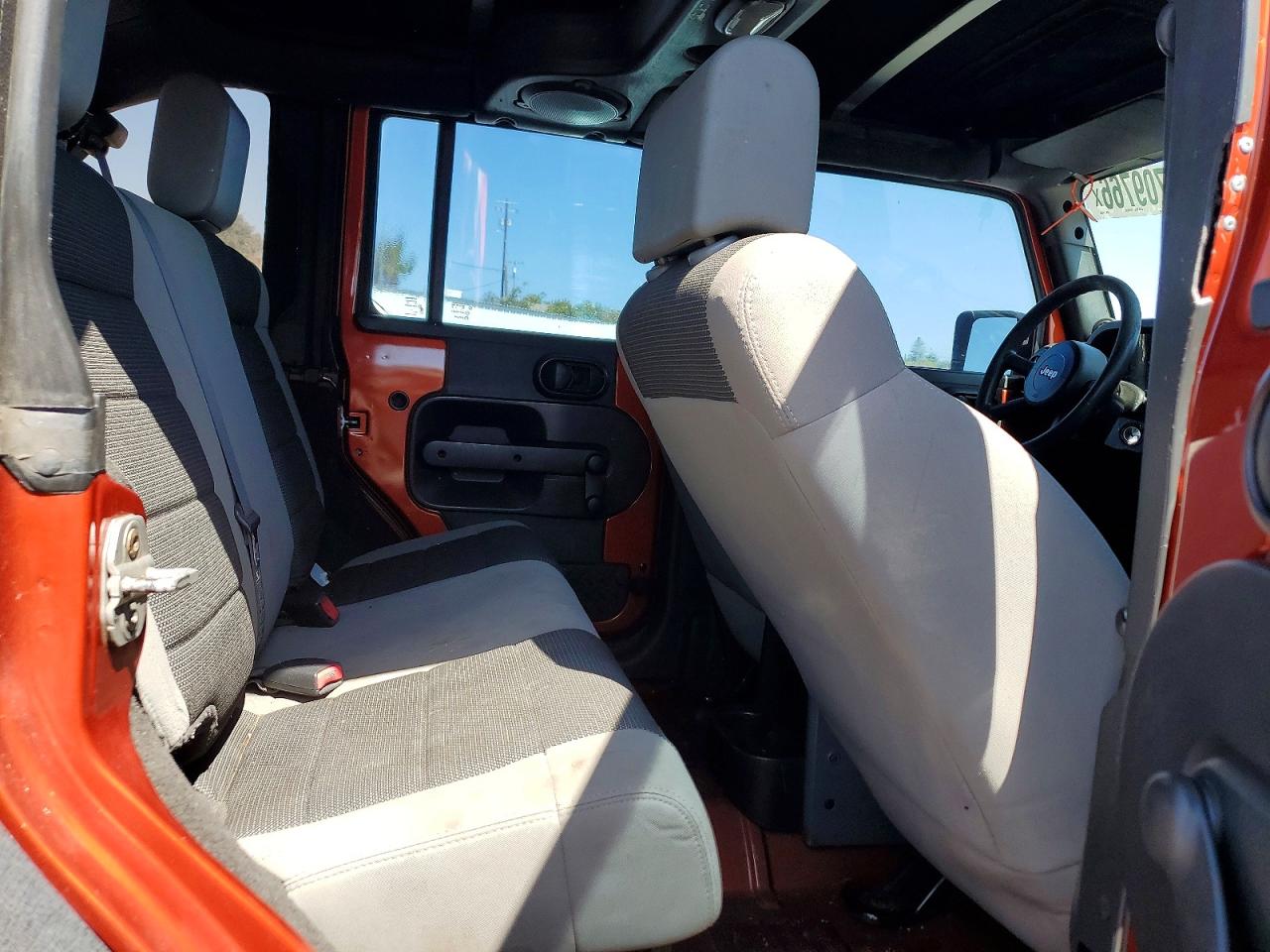 2009 Jeep Wrangler Unlimited X Orange vin: 1J4GA391X9L772259