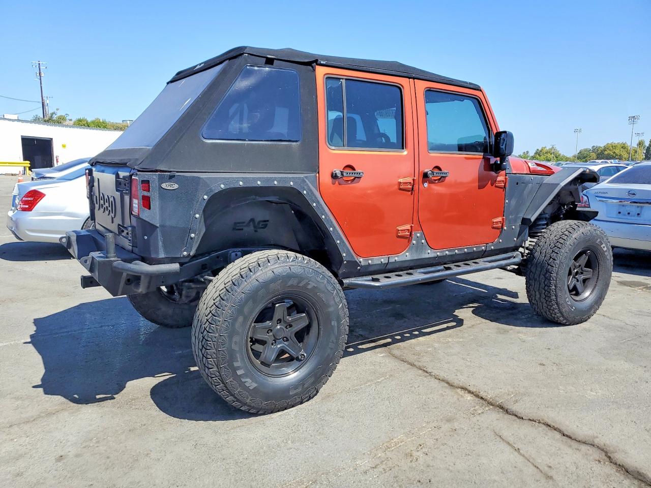 2009 Jeep Wrangler Unlimited X Orange vin: 1J4GA391X9L772259