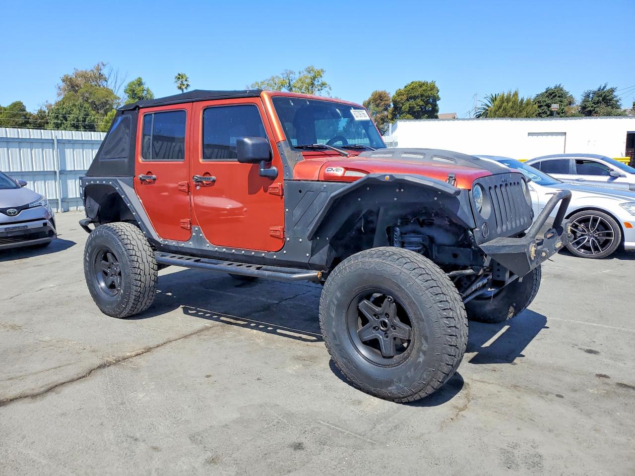 2009 Jeep Wrangler Unlimited X Orange vin: 1J4GA391X9L772259