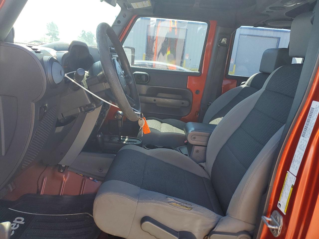 2009 Jeep Wrangler Unlimited X Orange vin: 1J4GA391X9L772259