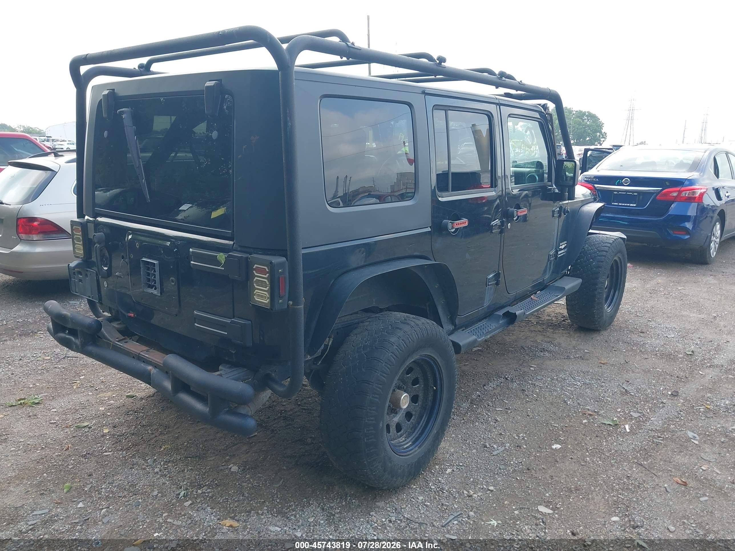 2009 Jeep Wrangler Unlimited Sahara Black vin: 1J4GA59109L707920