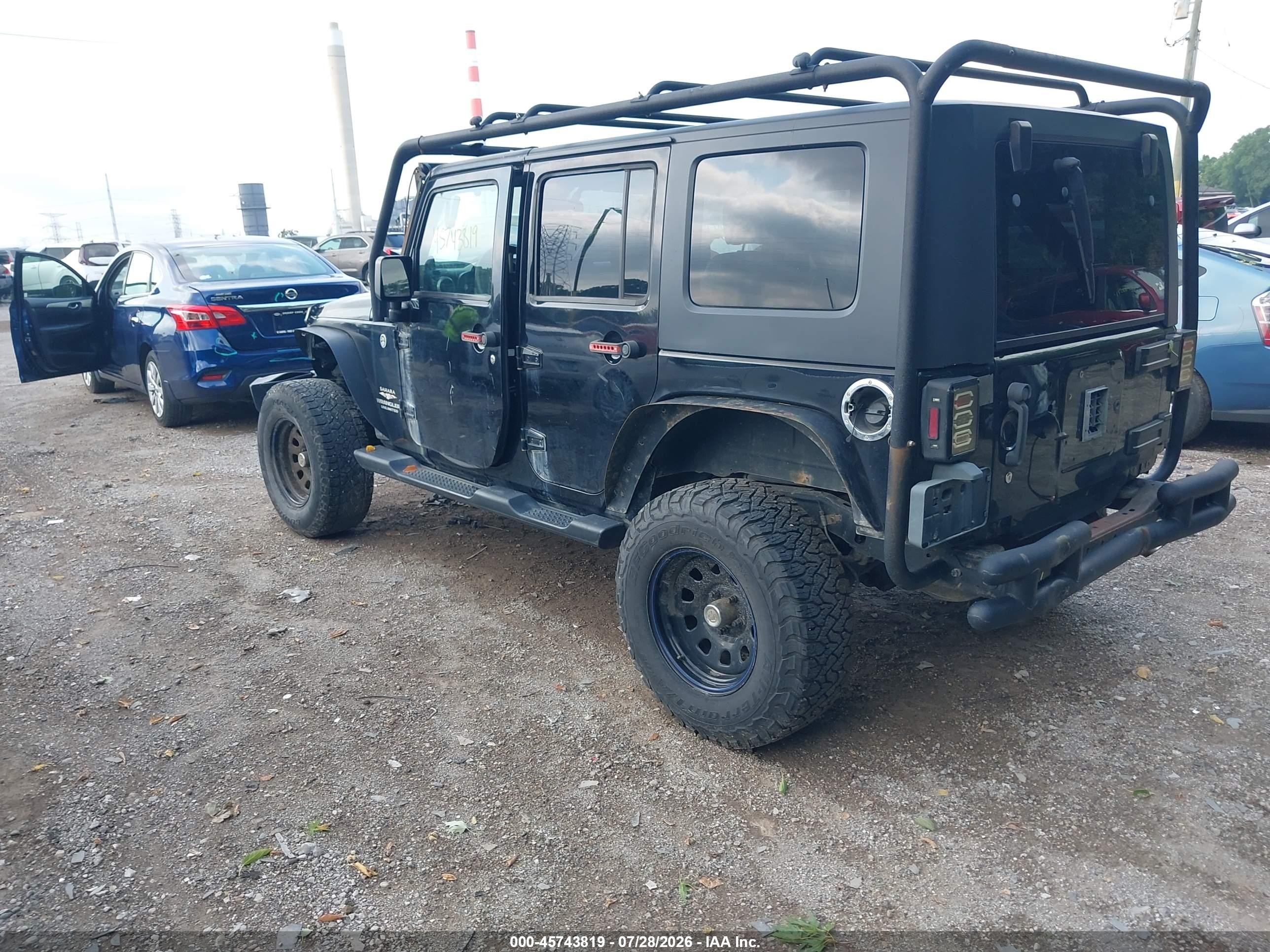 2009 Jeep Wrangler Unlimited Sahara Black vin: 1J4GA59109L707920