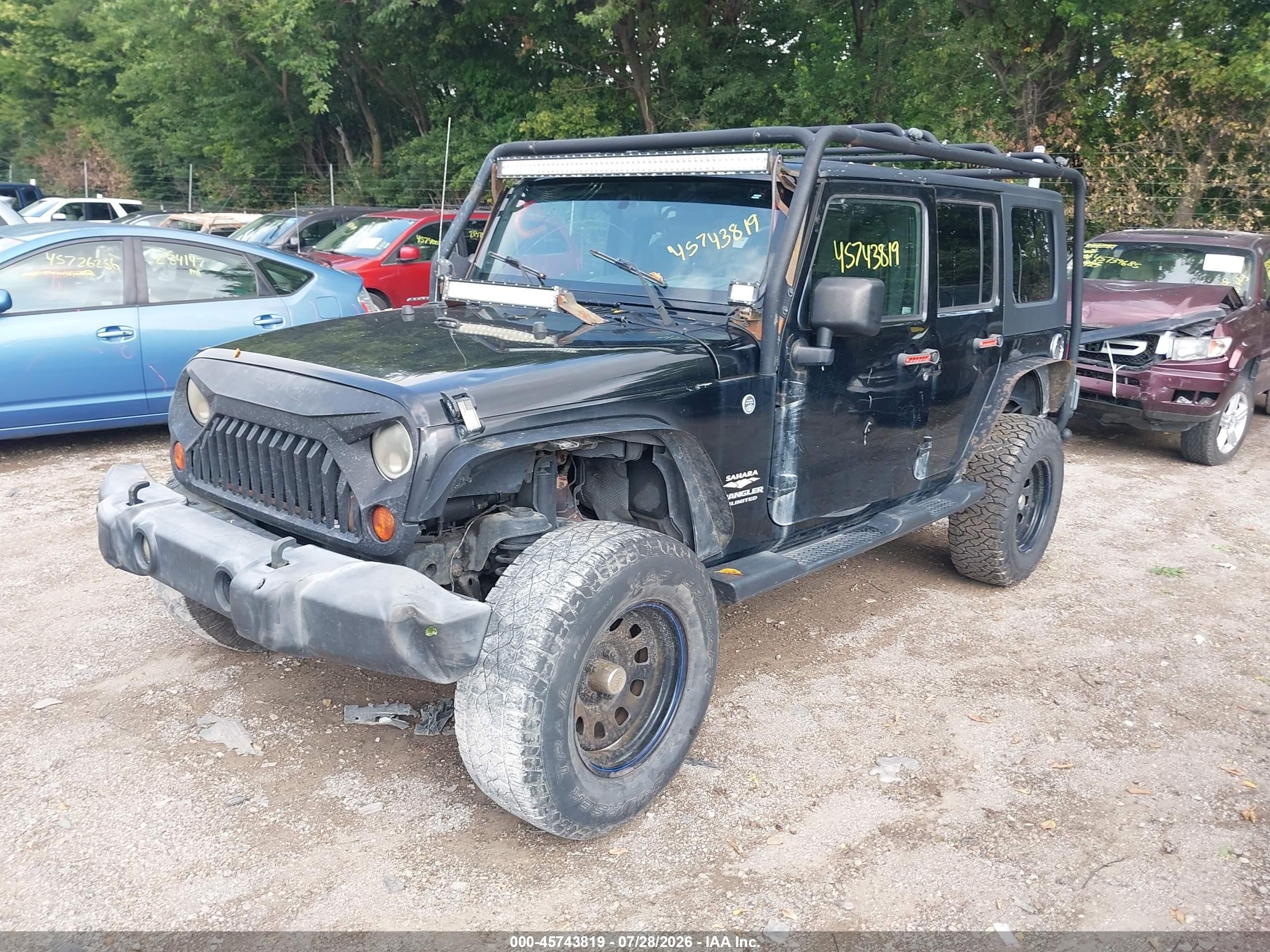 2009 Jeep Wrangler Unlimited Sahara Black vin: 1J4GA59109L707920
