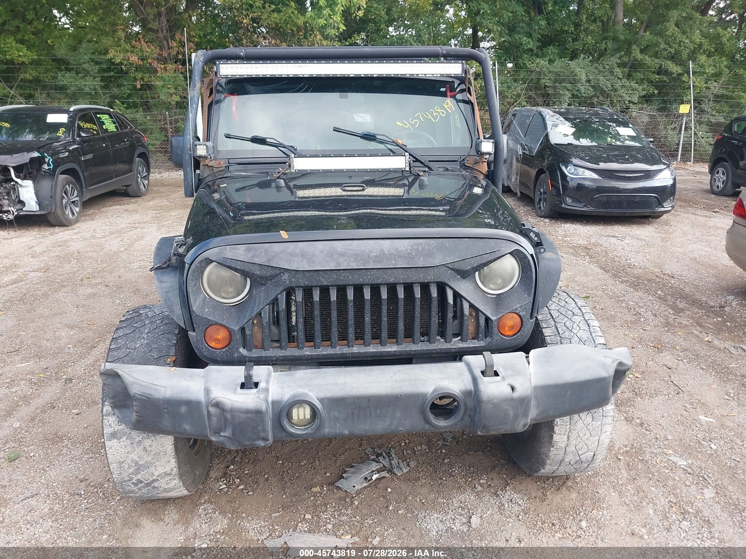 2009 Jeep Wrangler Unlimited Sahara Black vin: 1J4GA59109L707920