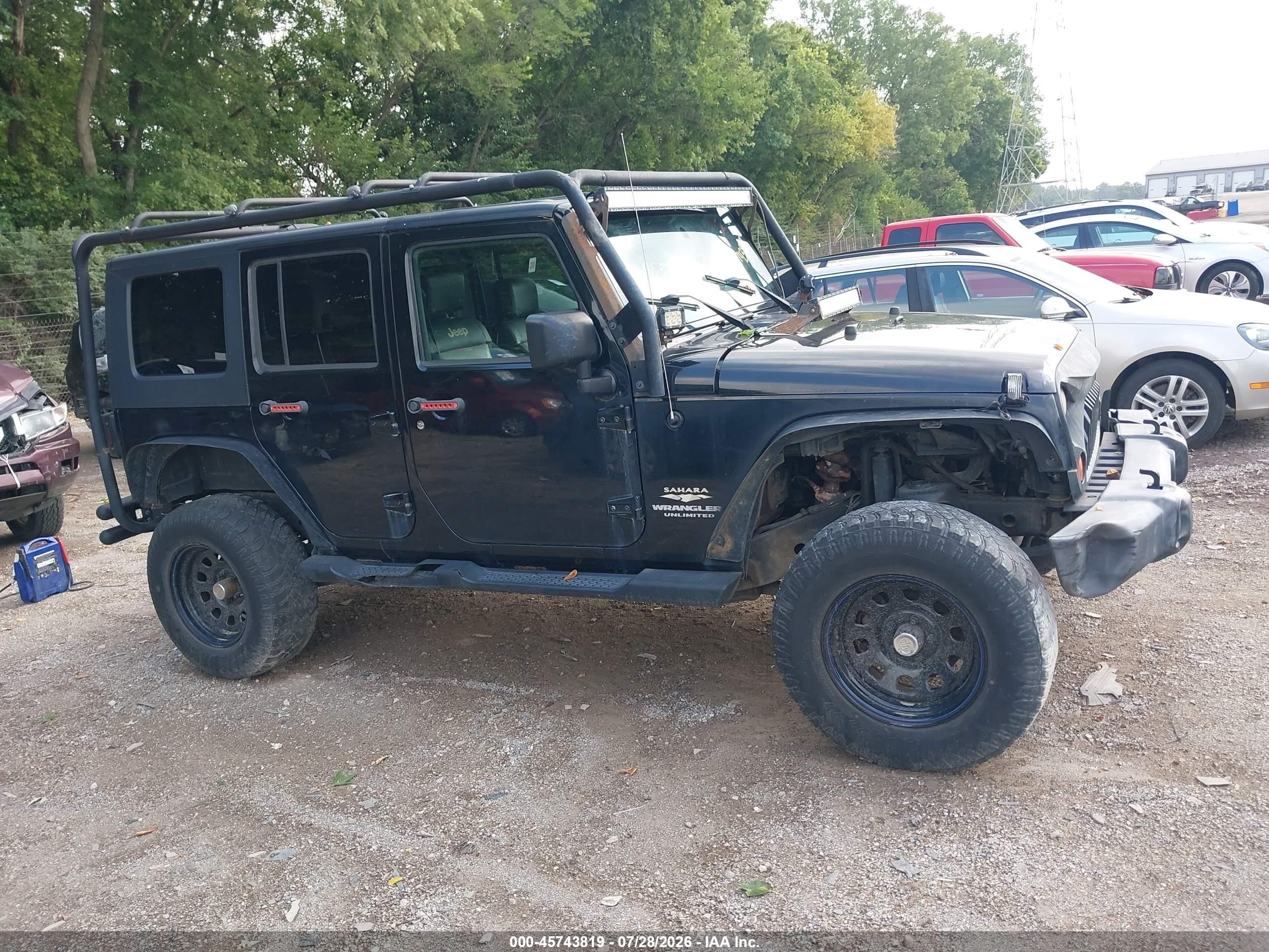 2009 Jeep Wrangler Unlimited Sahara Black vin: 1J4GA59109L707920