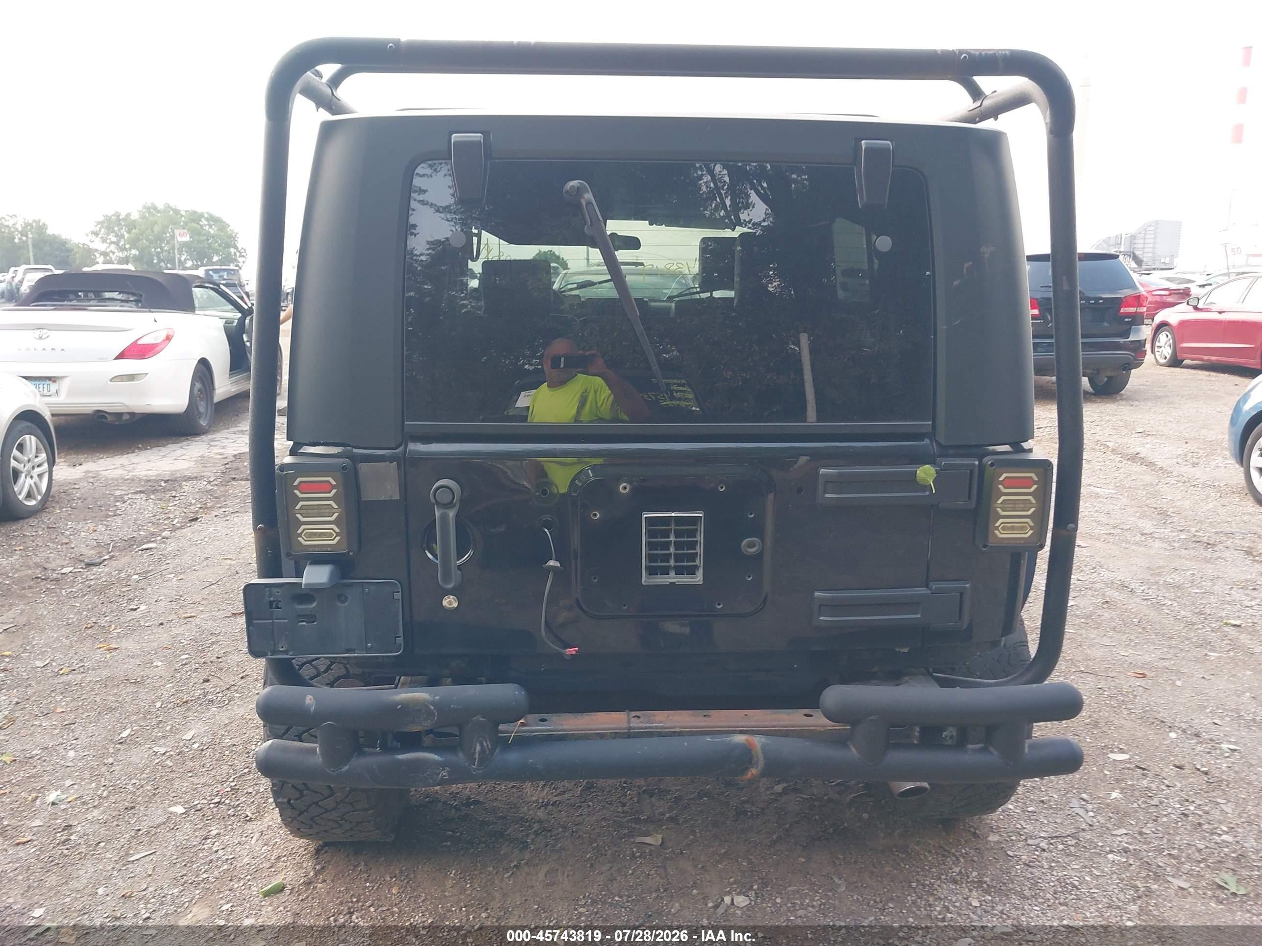 2009 Jeep Wrangler Unlimited Sahara Black vin: 1J4GA59109L707920