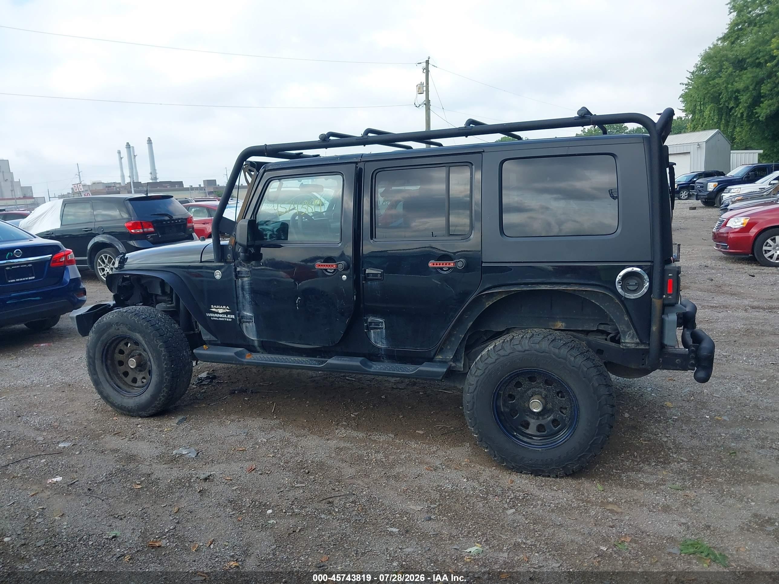 2009 Jeep Wrangler Unlimited Sahara Black vin: 1J4GA59109L707920