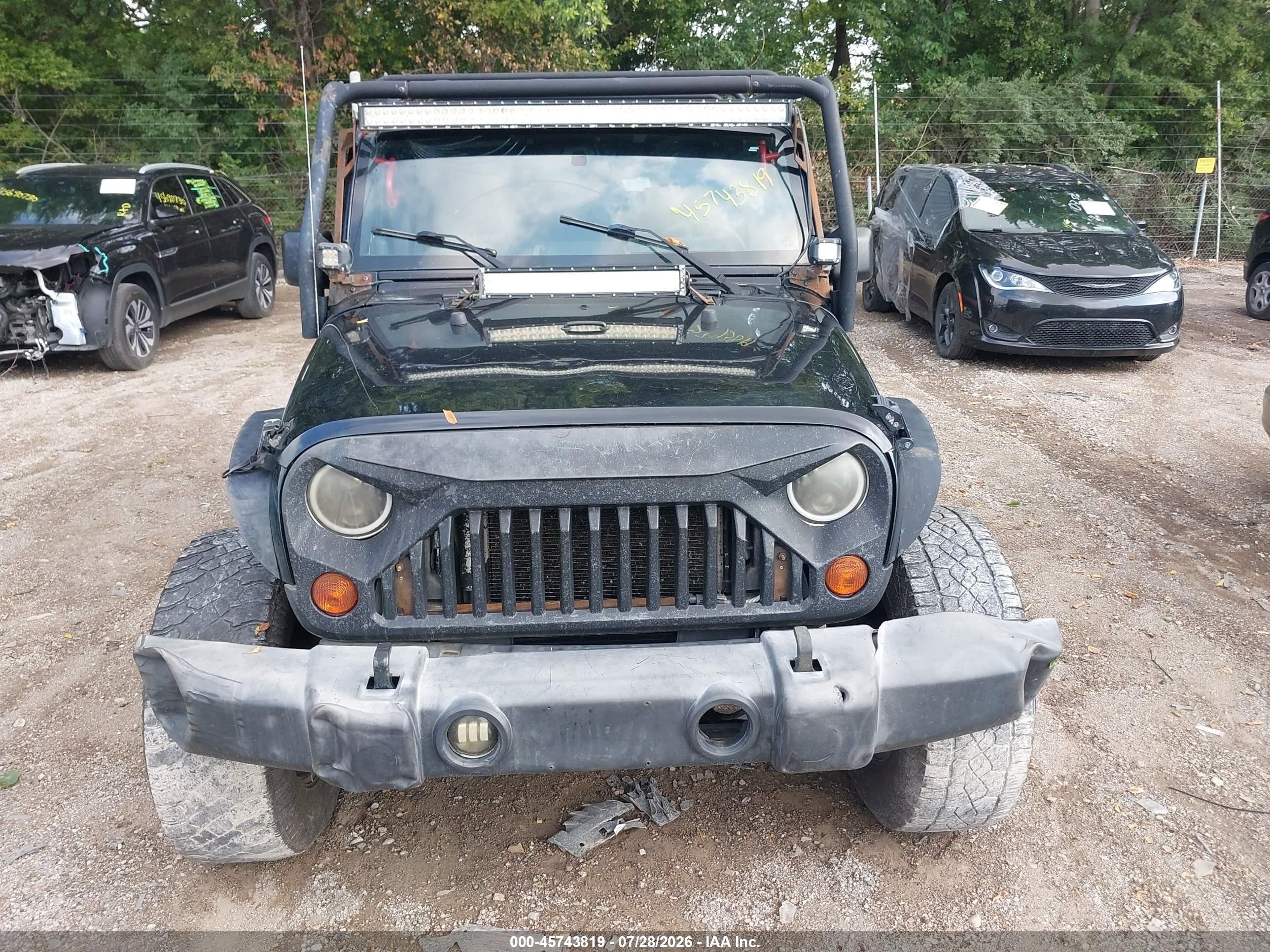 2009 Jeep Wrangler Unlimited Sahara Black vin: 1J4GA59109L707920
