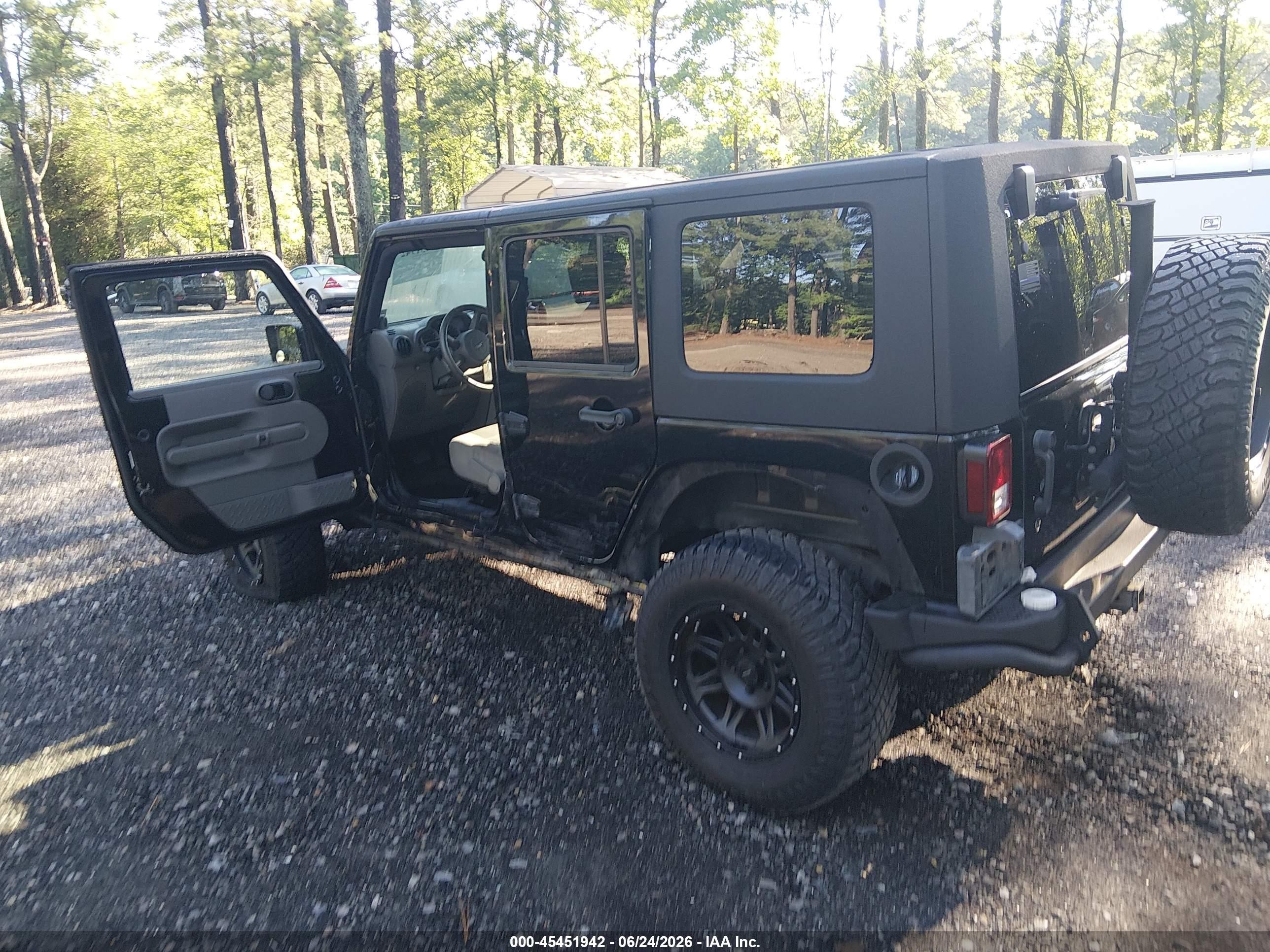 2007 Jeep Wrangler Unlimited Sahara Black vin: 1J4GA59117L118243