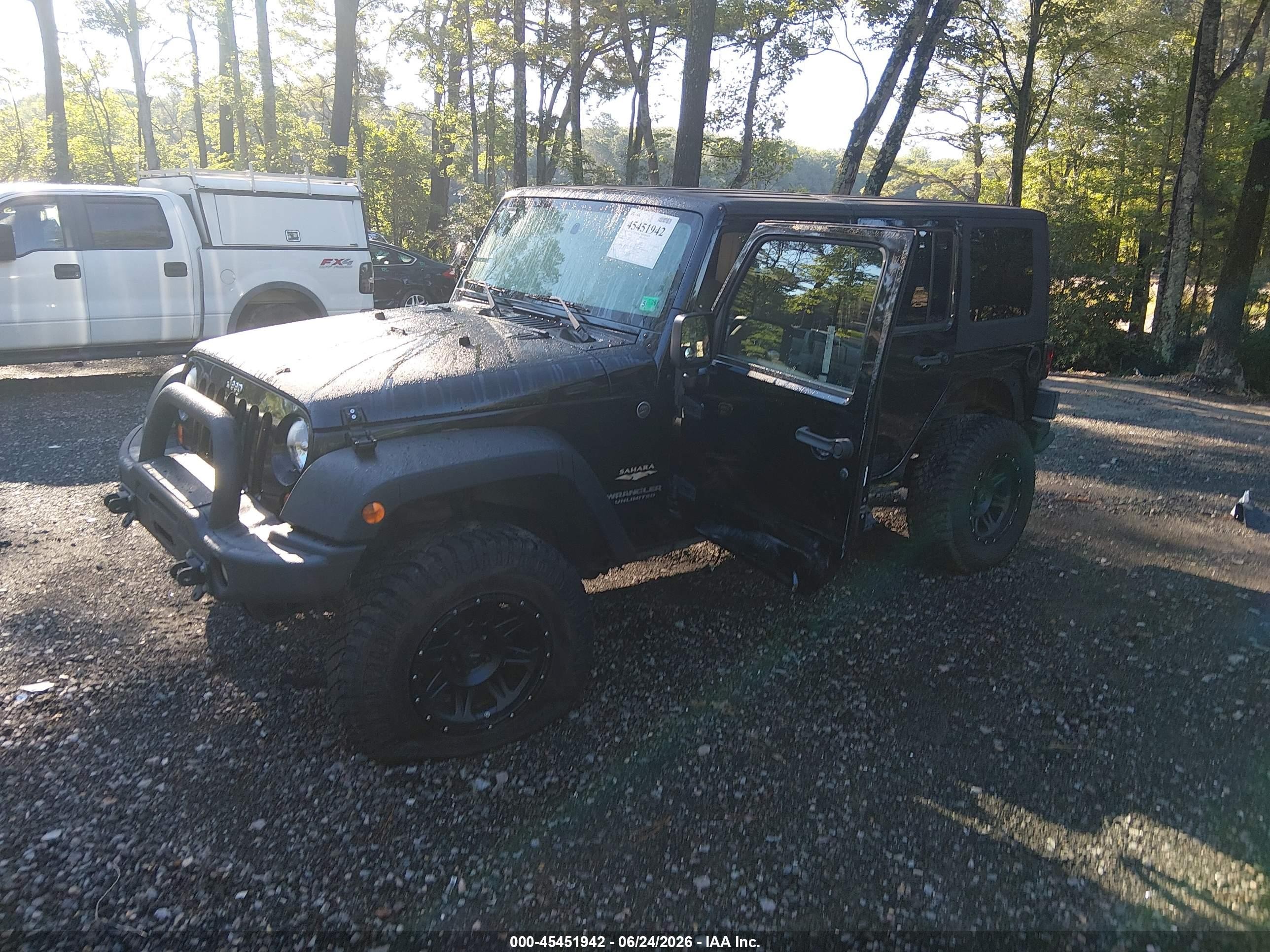 2007 Jeep Wrangler Unlimited Sahara Black vin: 1J4GA59117L118243