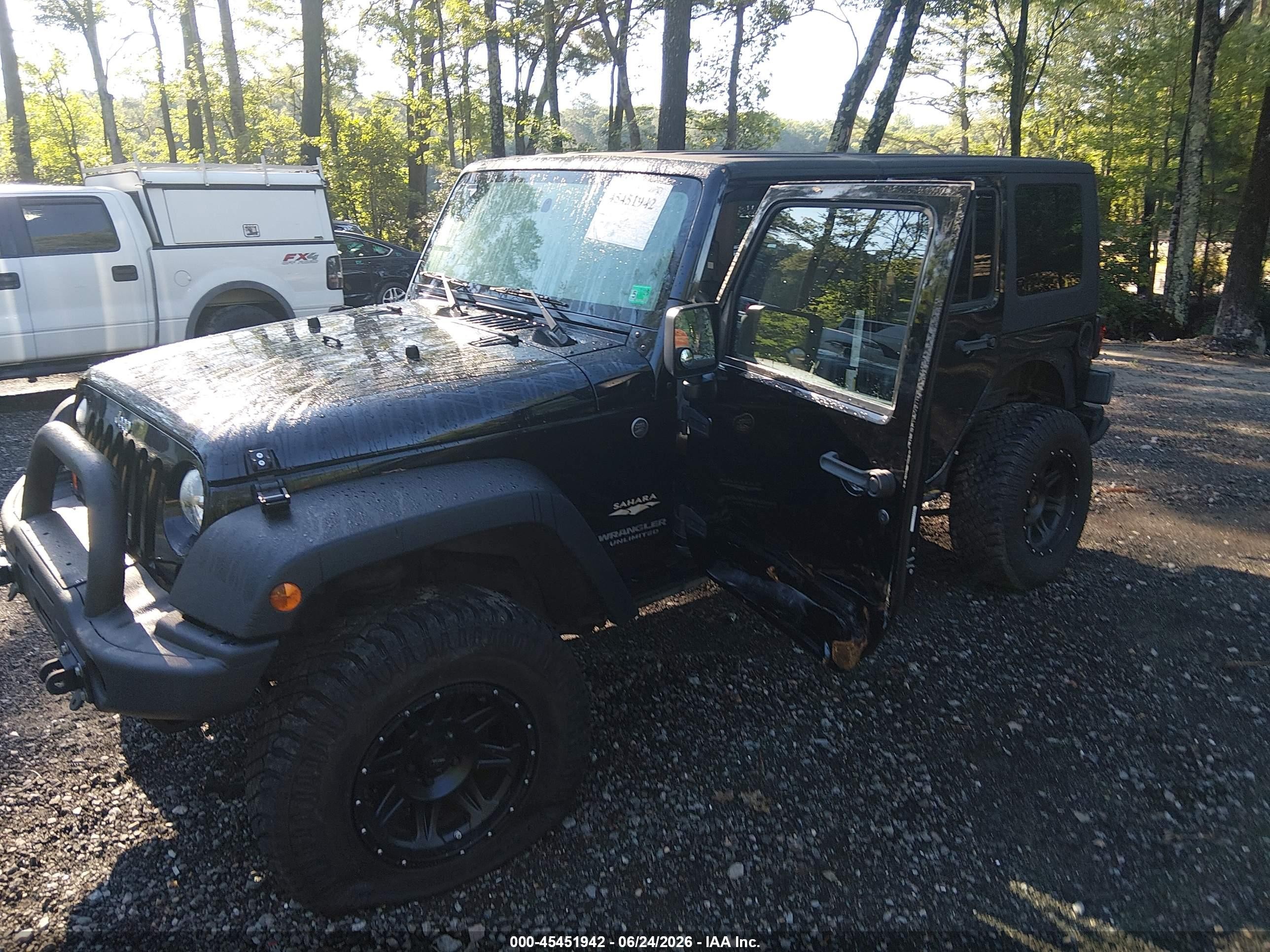 2007 Jeep Wrangler Unlimited Sahara Black vin: 1J4GA59117L118243