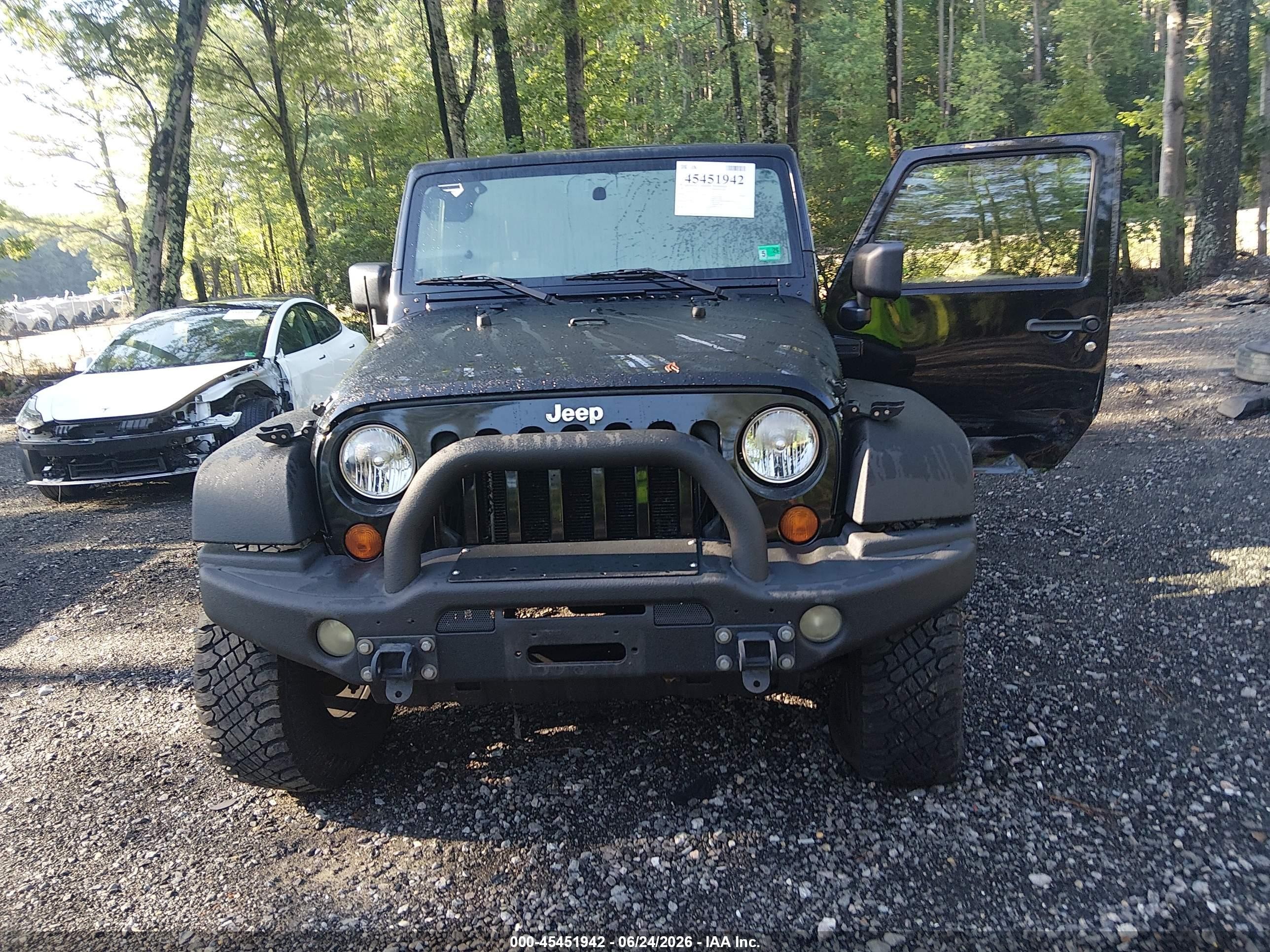 2007 Jeep Wrangler Unlimited Sahara Black vin: 1J4GA59117L118243