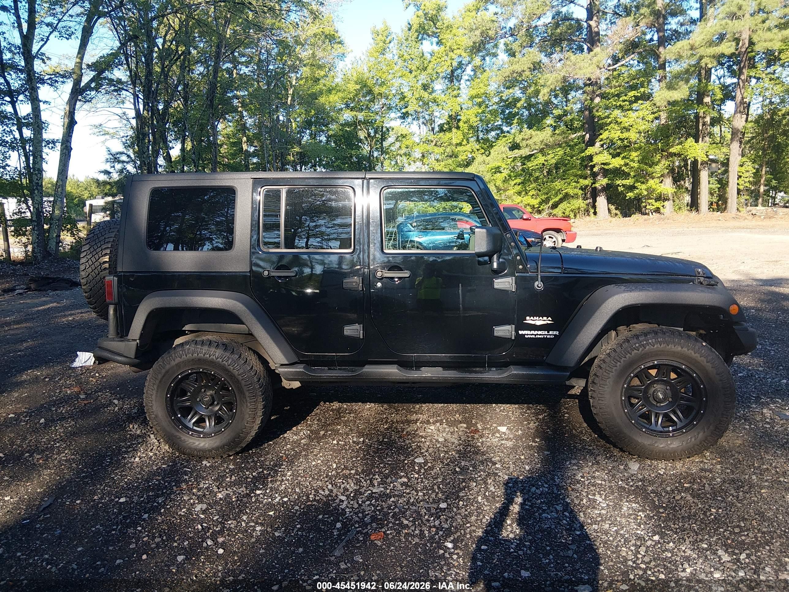 2007 Jeep Wrangler Unlimited Sahara Black vin: 1J4GA59117L118243