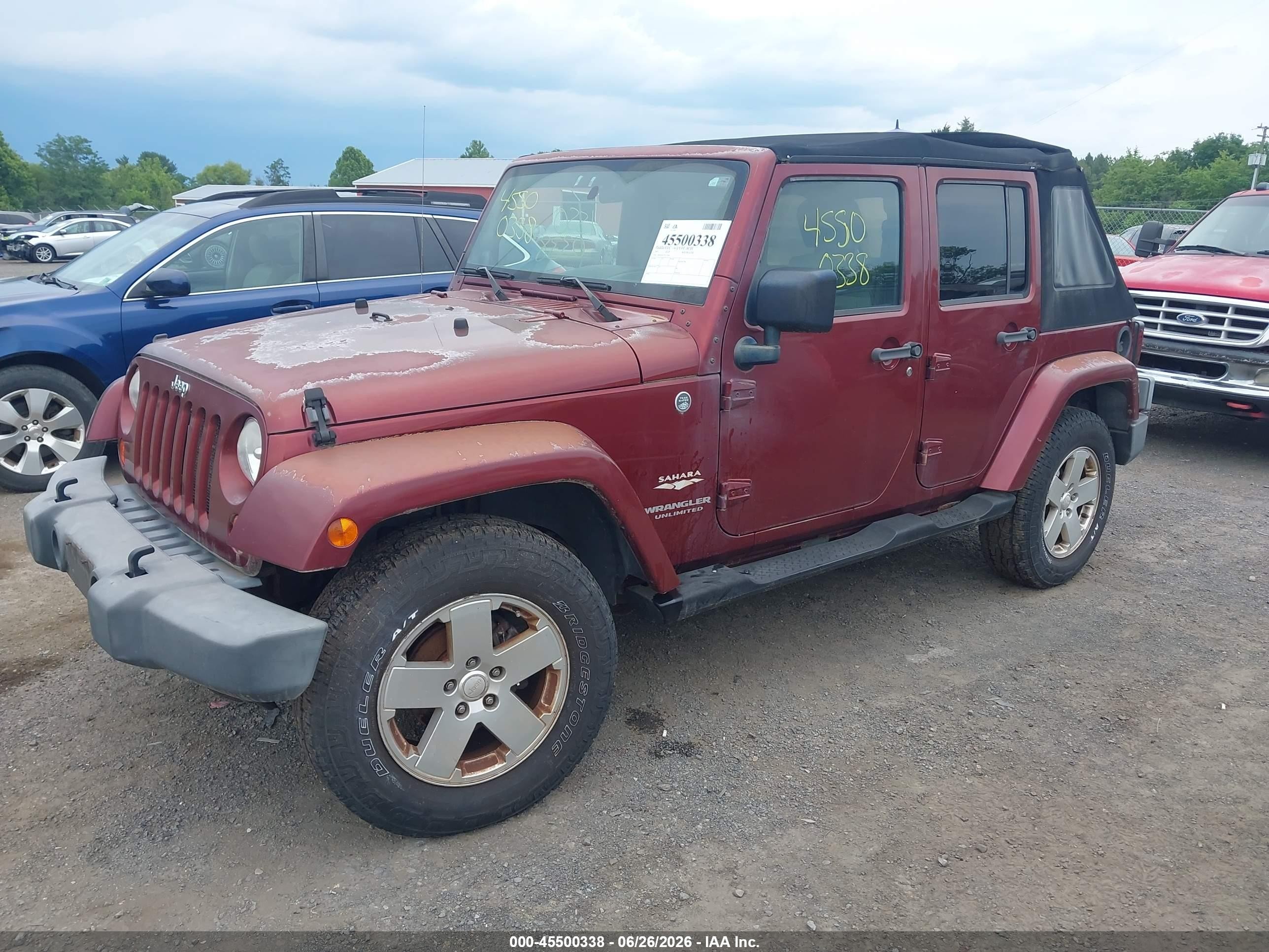 2007 Jeep Wrangler Unlimited Sahara Burgundy vin: 1J4GA59117L157902